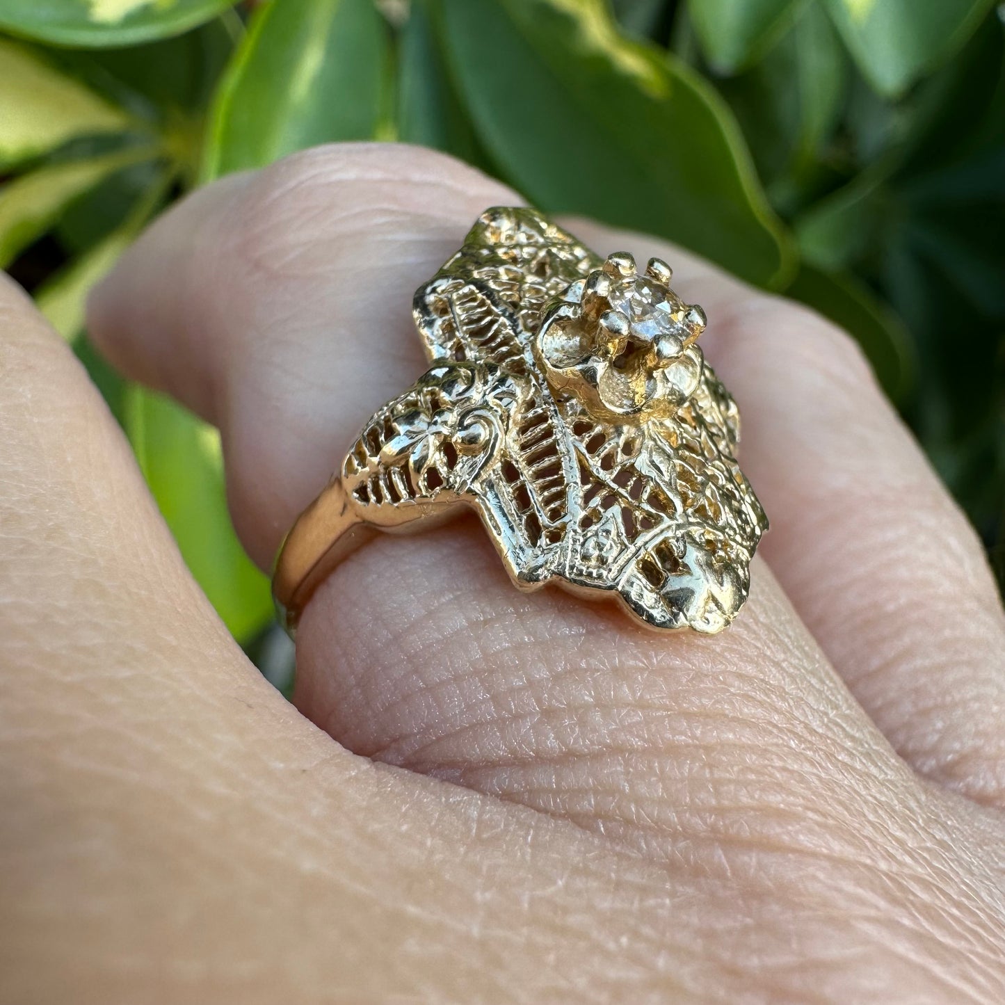 14K gold filigree ring set with an old-cut Diamond