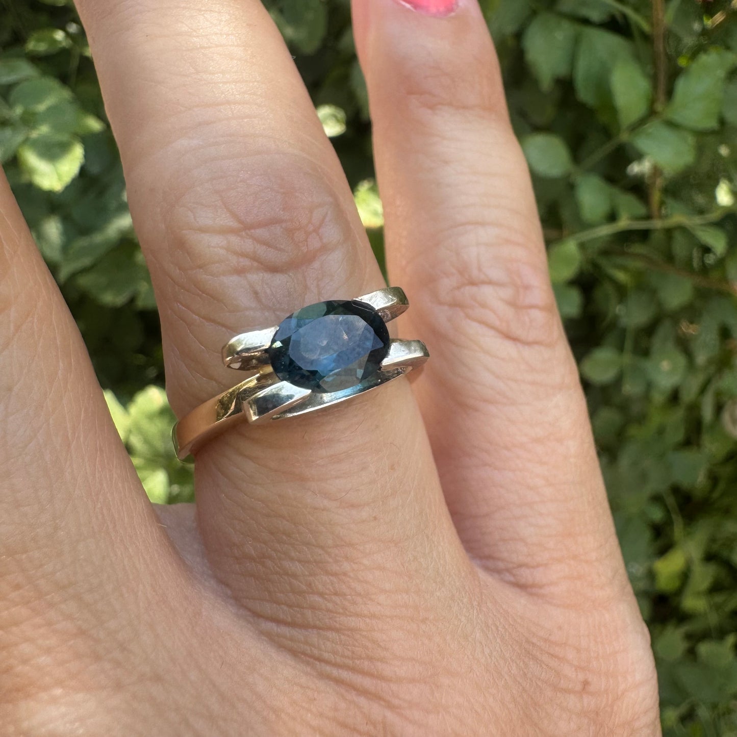 14K gold ring set with an oval-cut Blue Topaz “London”