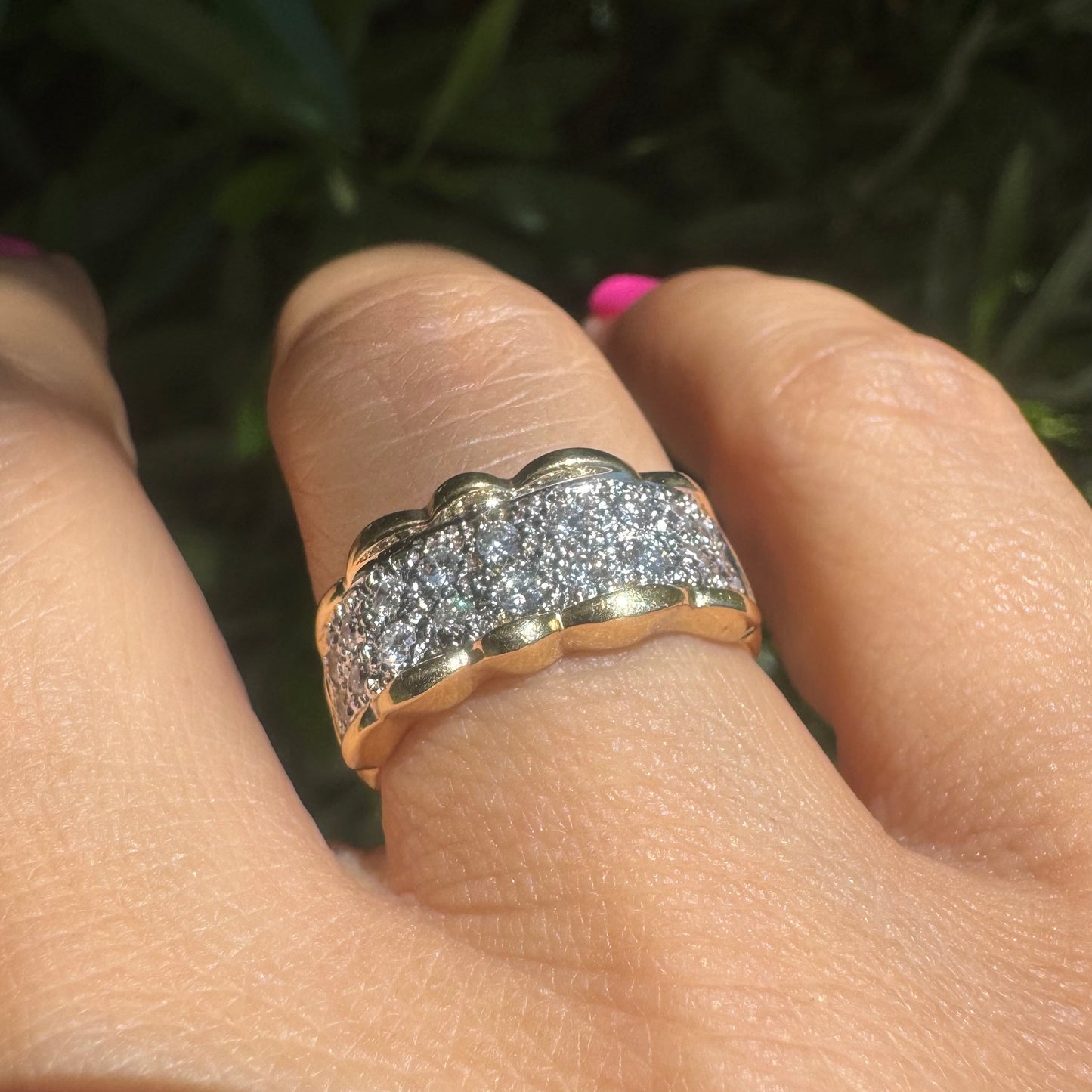 14K gold ring set with center pavé of sparkling Diamonds framed with softly waved gold edges