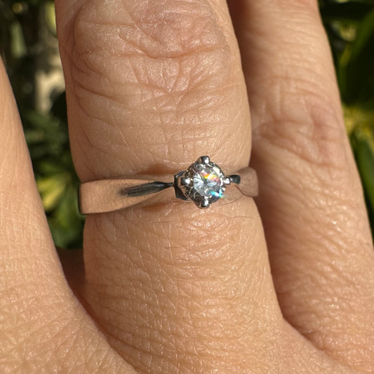 14K gold ring set with one center Diamond