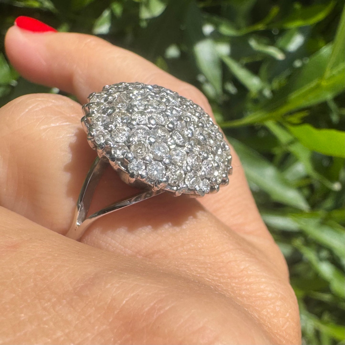 18K gold ring set with Diamonds in a bold pavé setting.