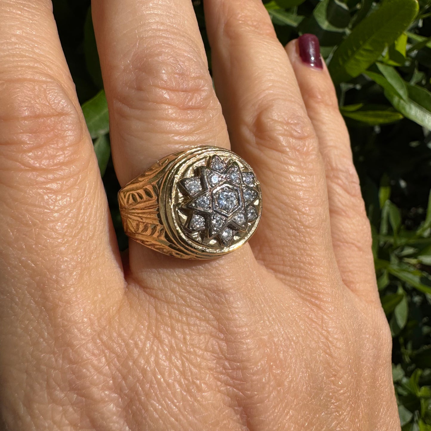 18K gold ring set with a dazzling double Star of David motif, meticulously set with shimmering Diamonds