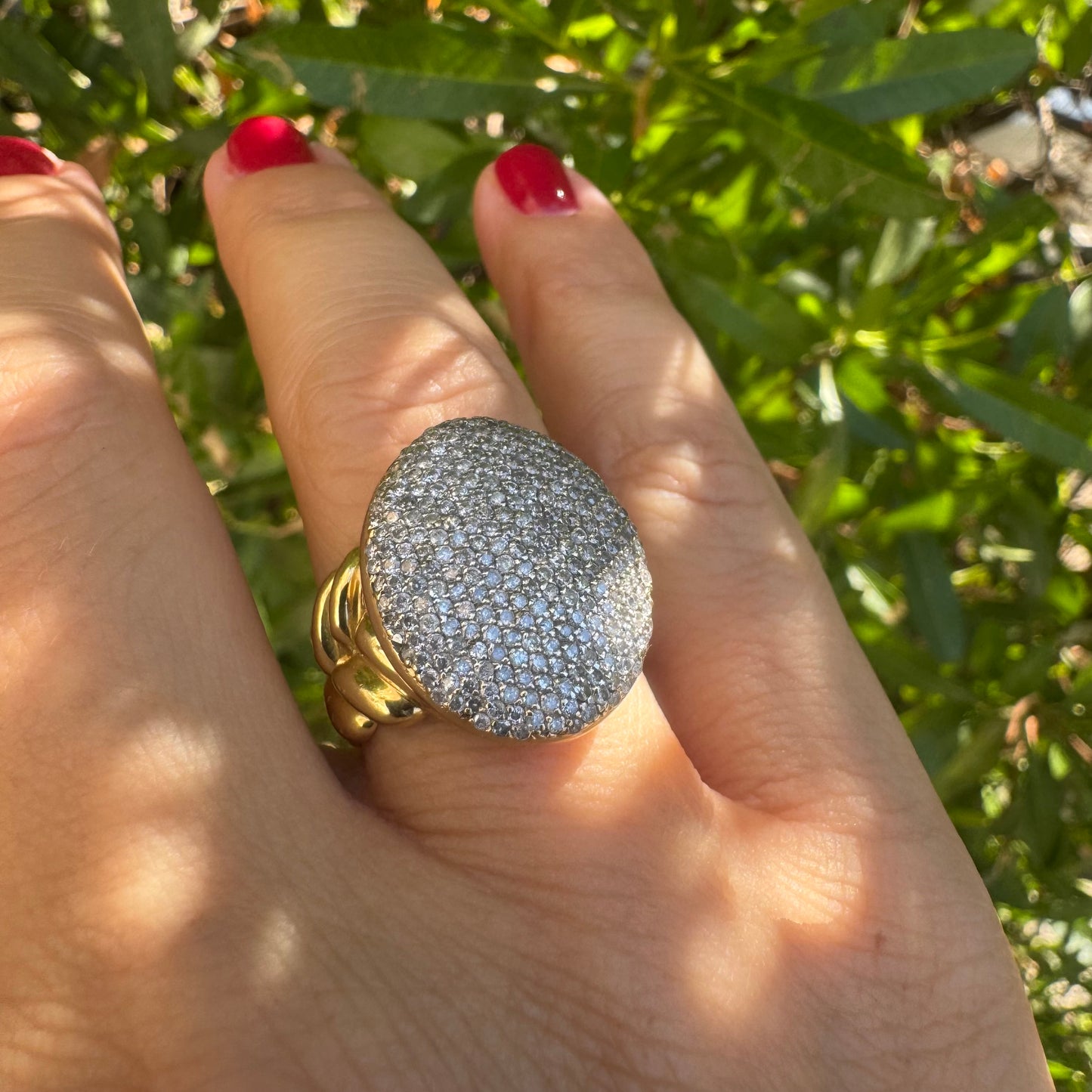 18K gold ring set with a dazzling dome of pavé-set diamonds