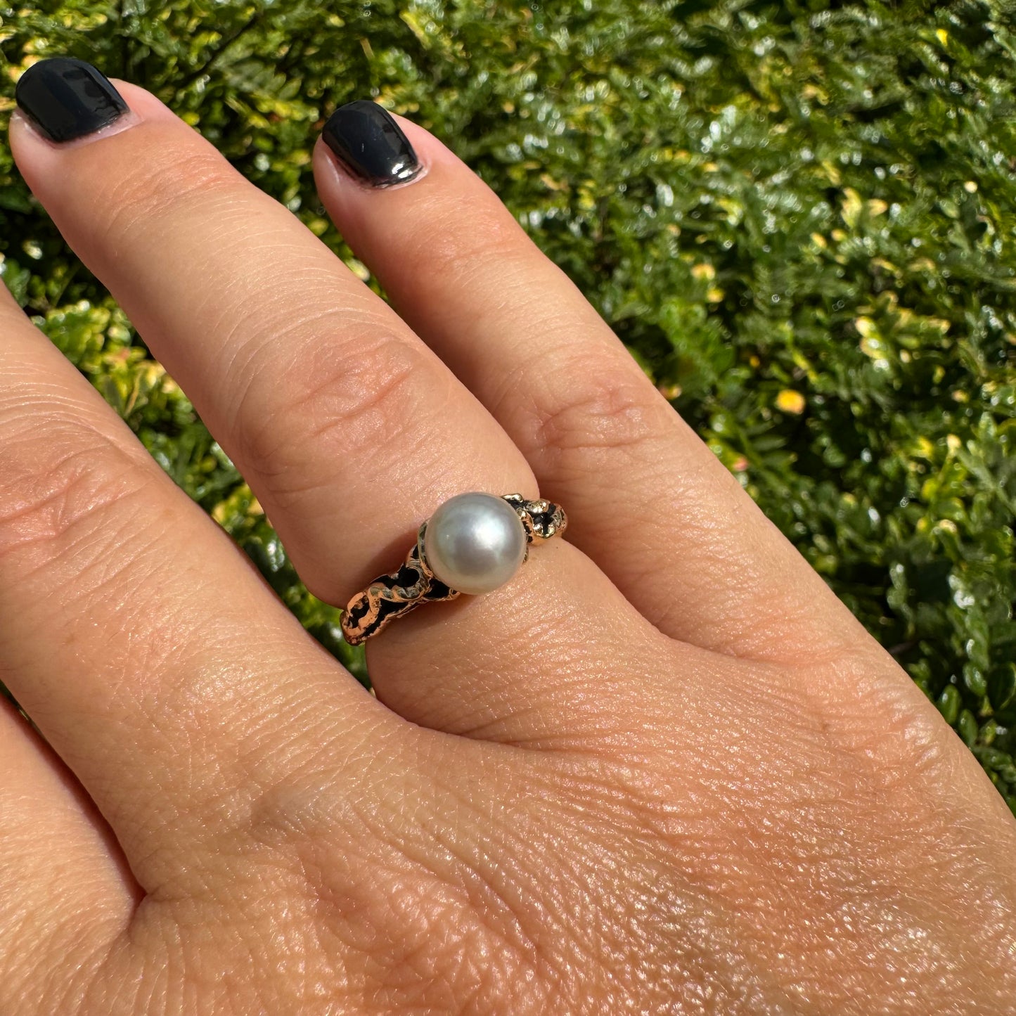 14K gold ring set a luminous white Pearl set on an ornate yellow gold band