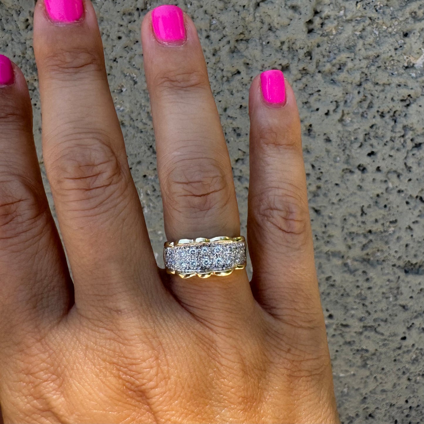 14K gold ring set with center pavé of sparkling Diamonds framed with softly waved gold edges