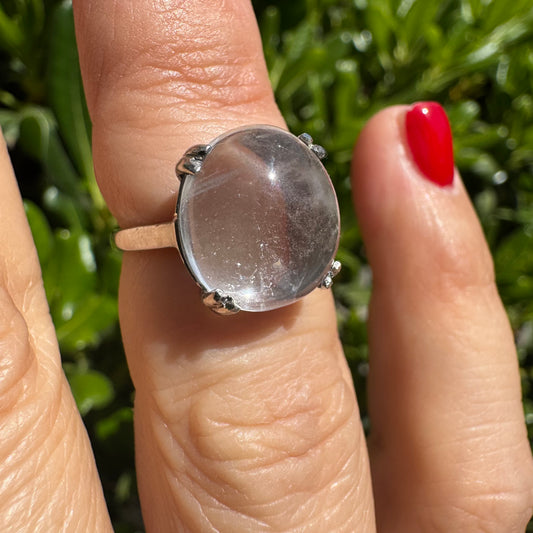 Palladium ring set with a large clear Rock Crystal cabochon.