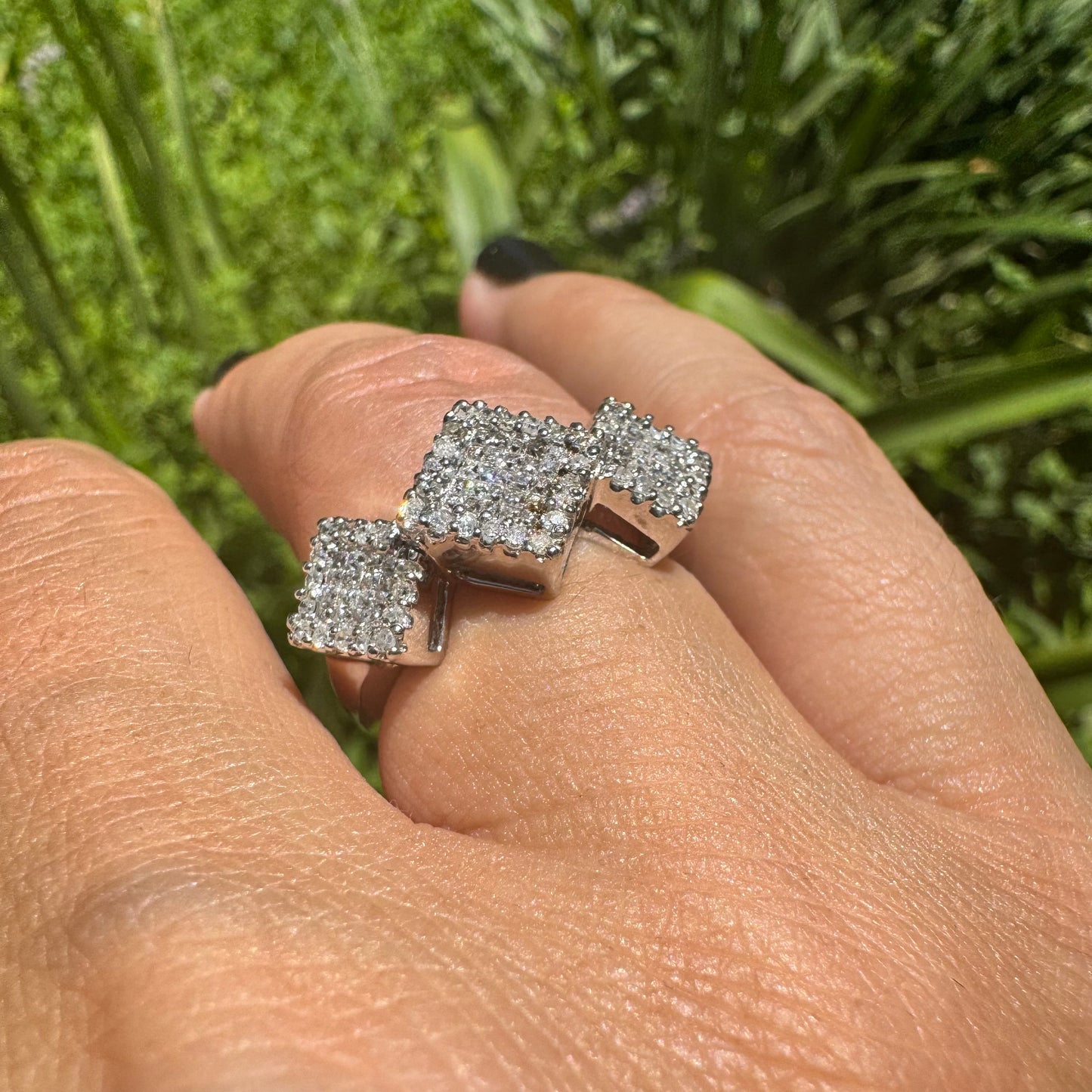 14K gold ring with three square clusters of sparkling Diamonds