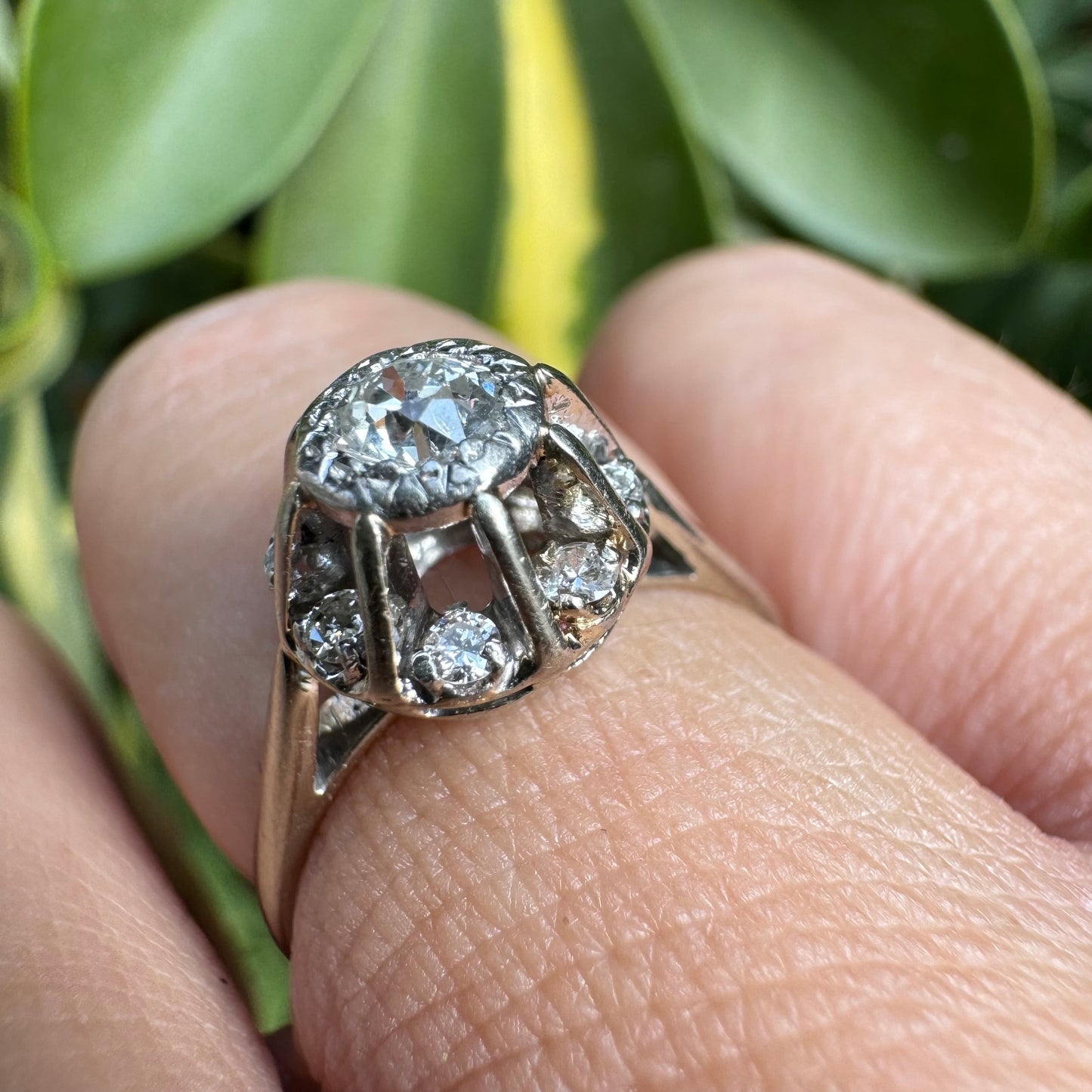 18K gold ring set with Diamonds in     a classic cluster-style