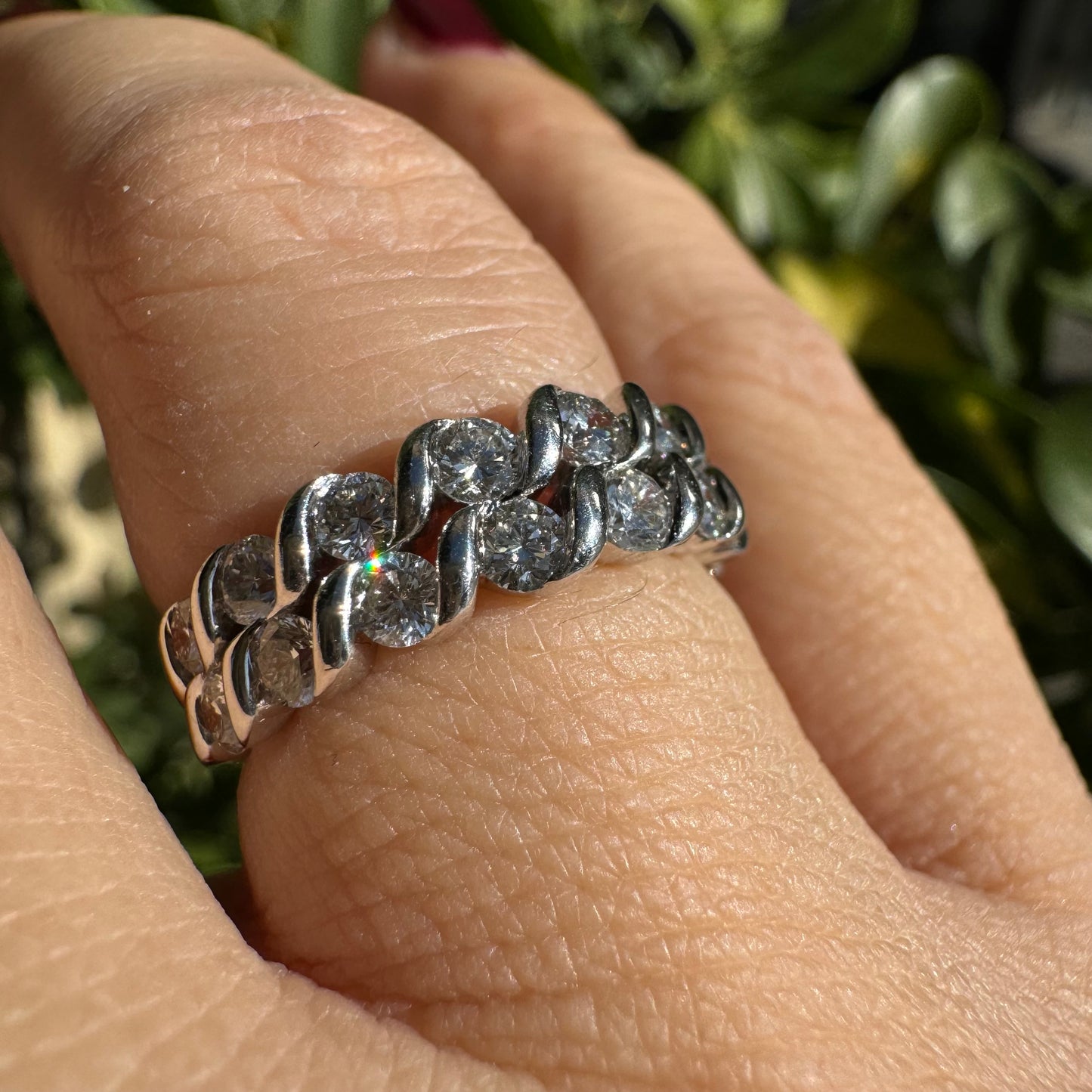 14K gold ring set with two rows of brilliant-cut Diamonds.