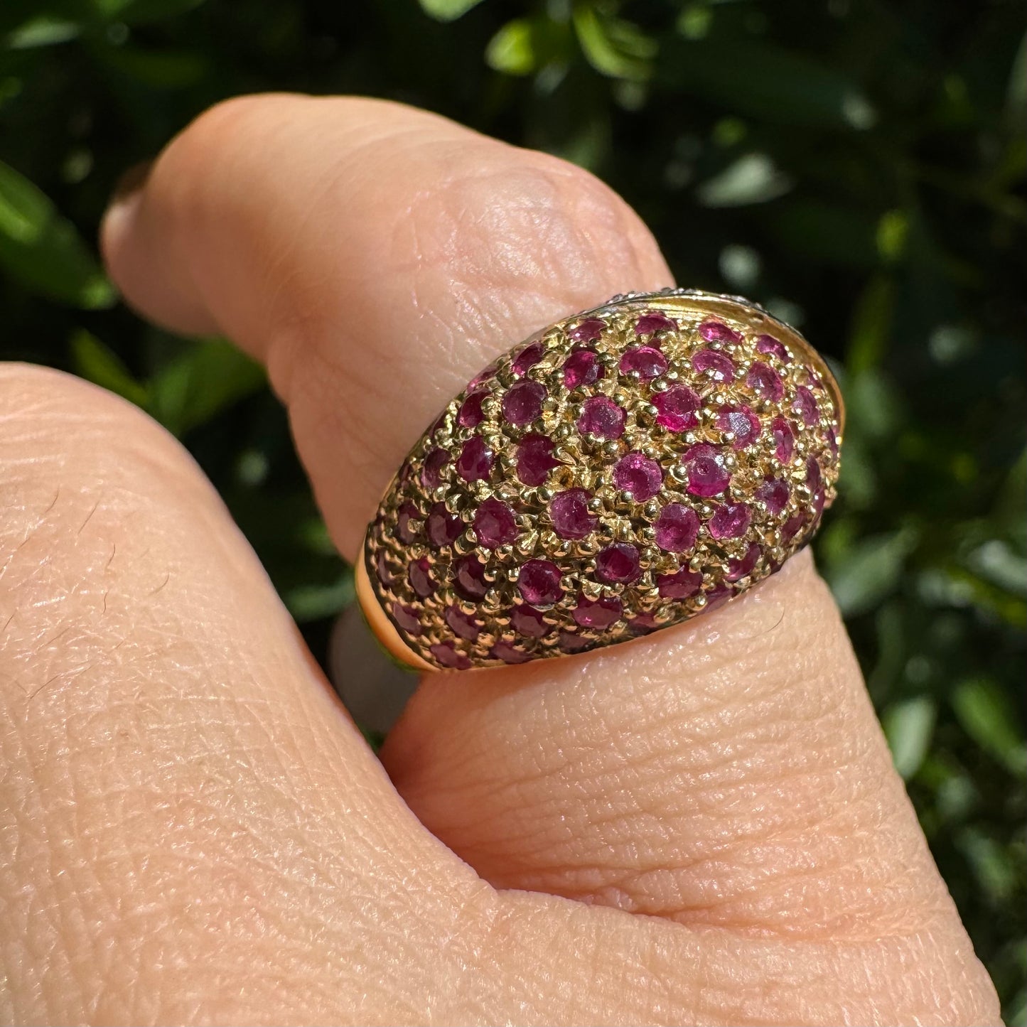 14K gold dome ring pavé-set with Diamonds and vivid Rubies in a striking two-tone design