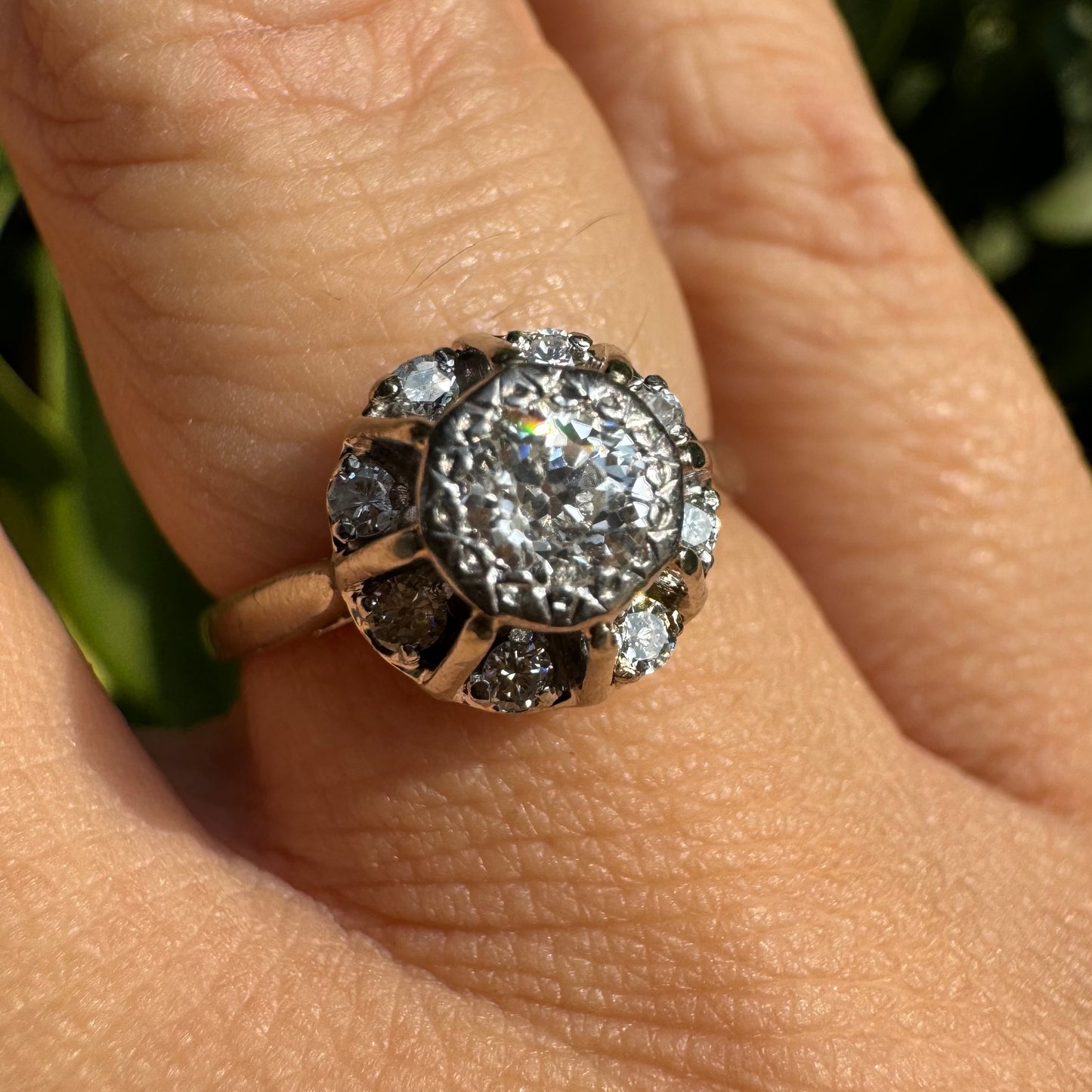 18K gold ring set with Diamonds in     a classic cluster-style