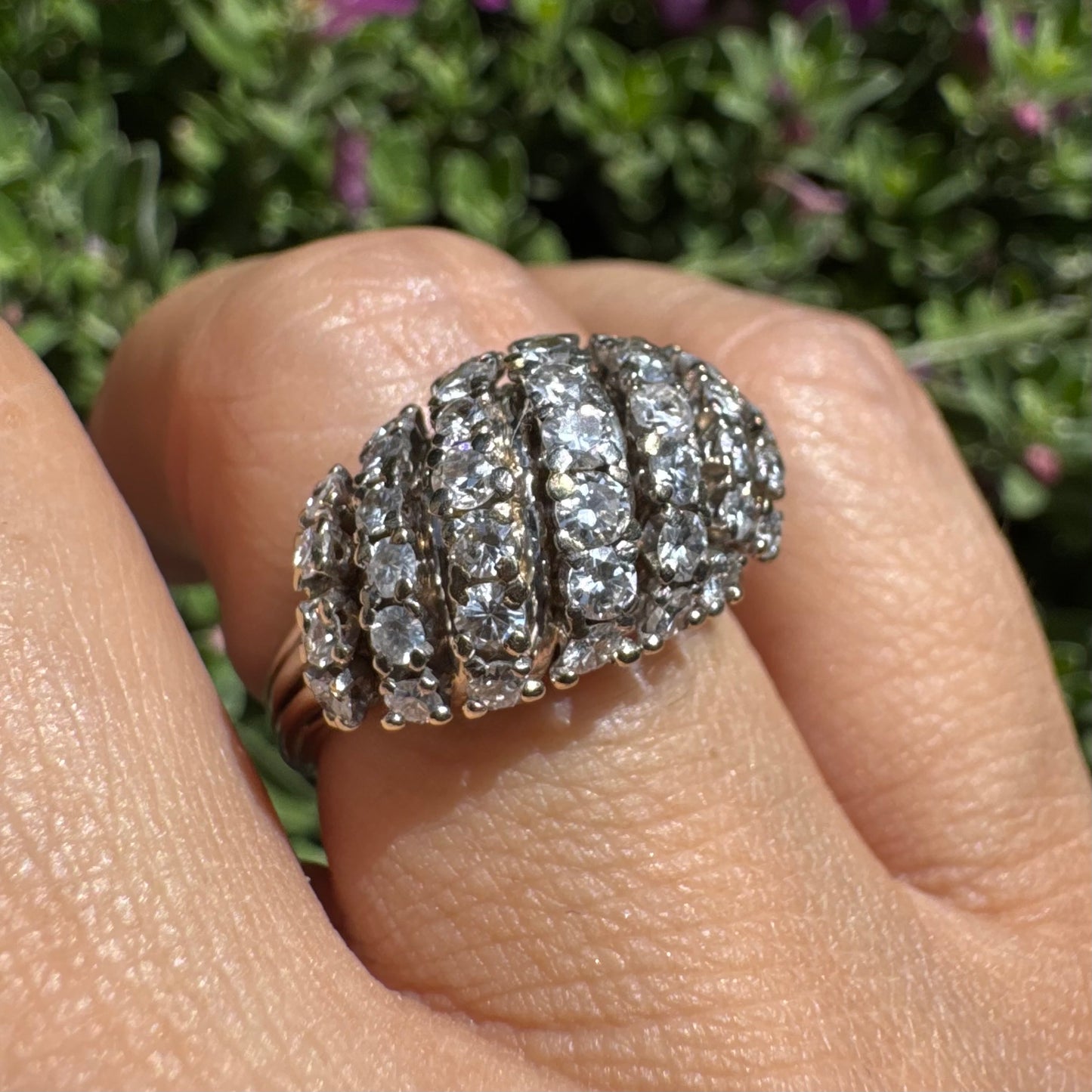 18K gold ring set with rows of sparkling Diamonds in a bold, sculptural design