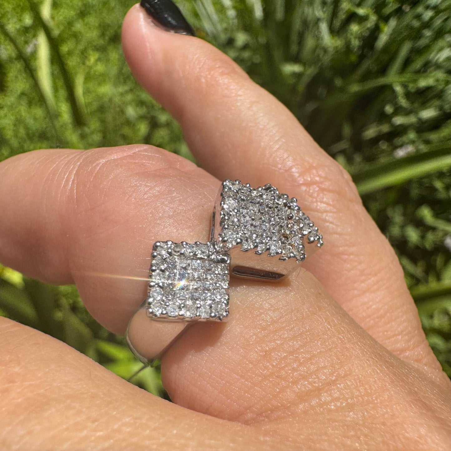 14K gold ring with three square clusters of sparkling Diamonds