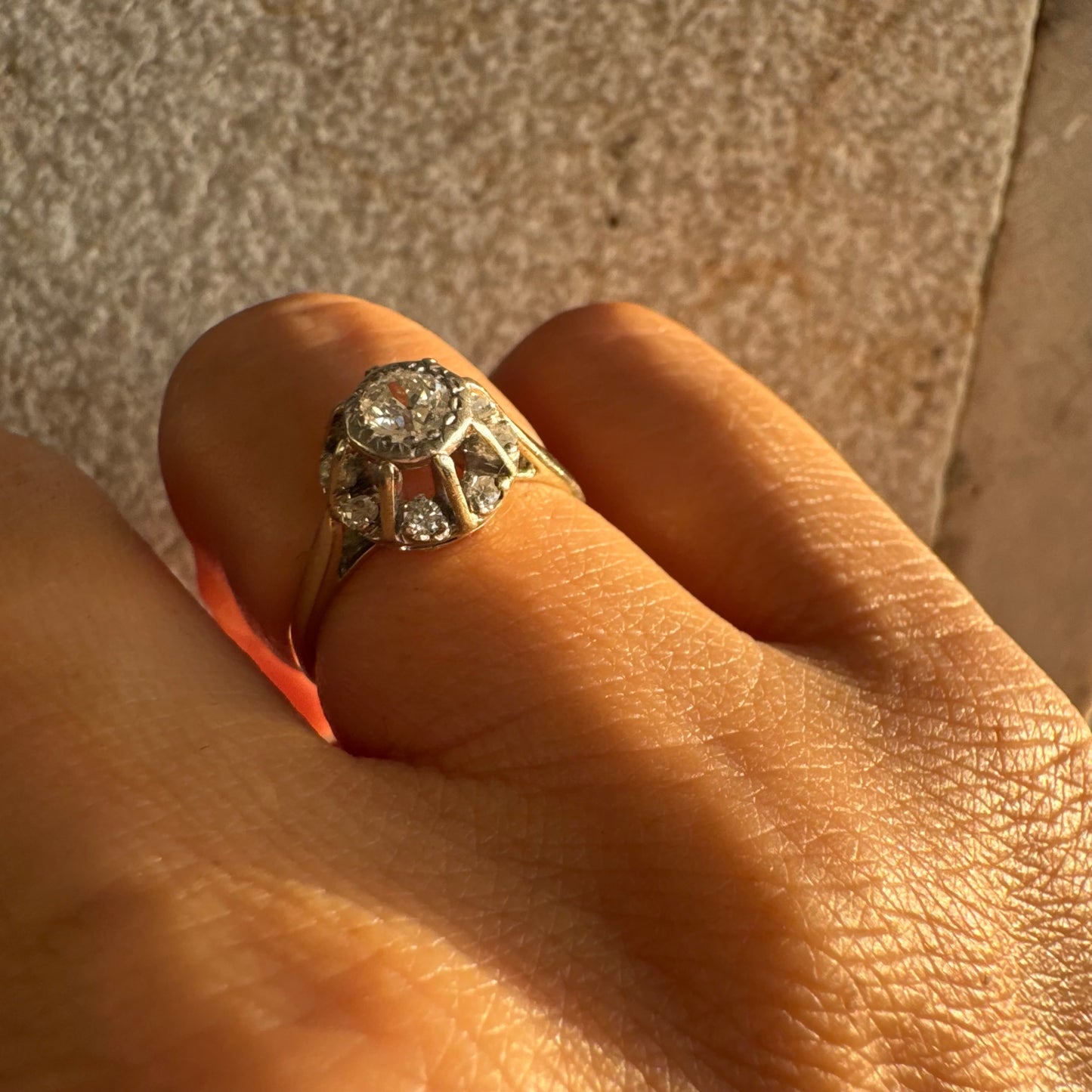 18K gold ring set with Diamonds in     a classic cluster-style