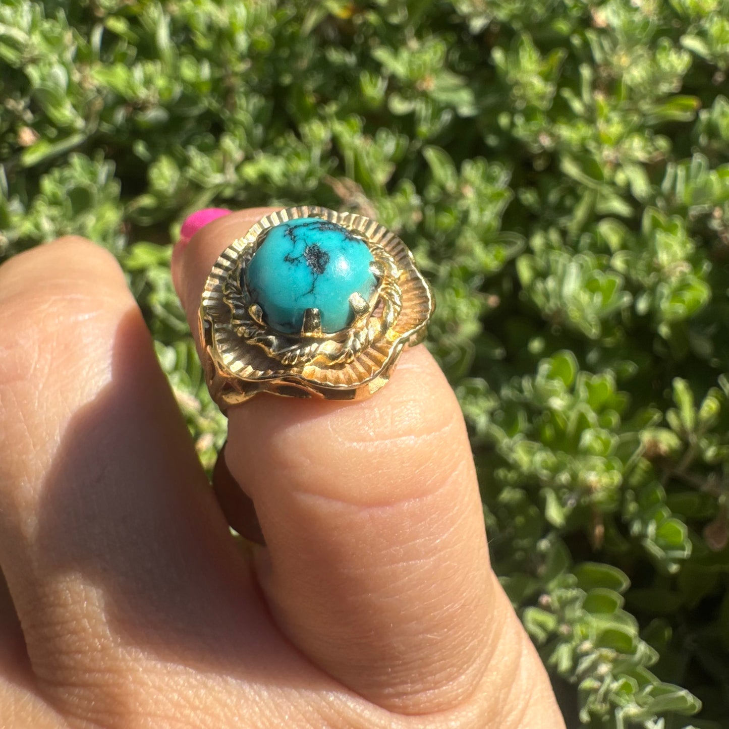 18K gold ring set with a unique Turquoise