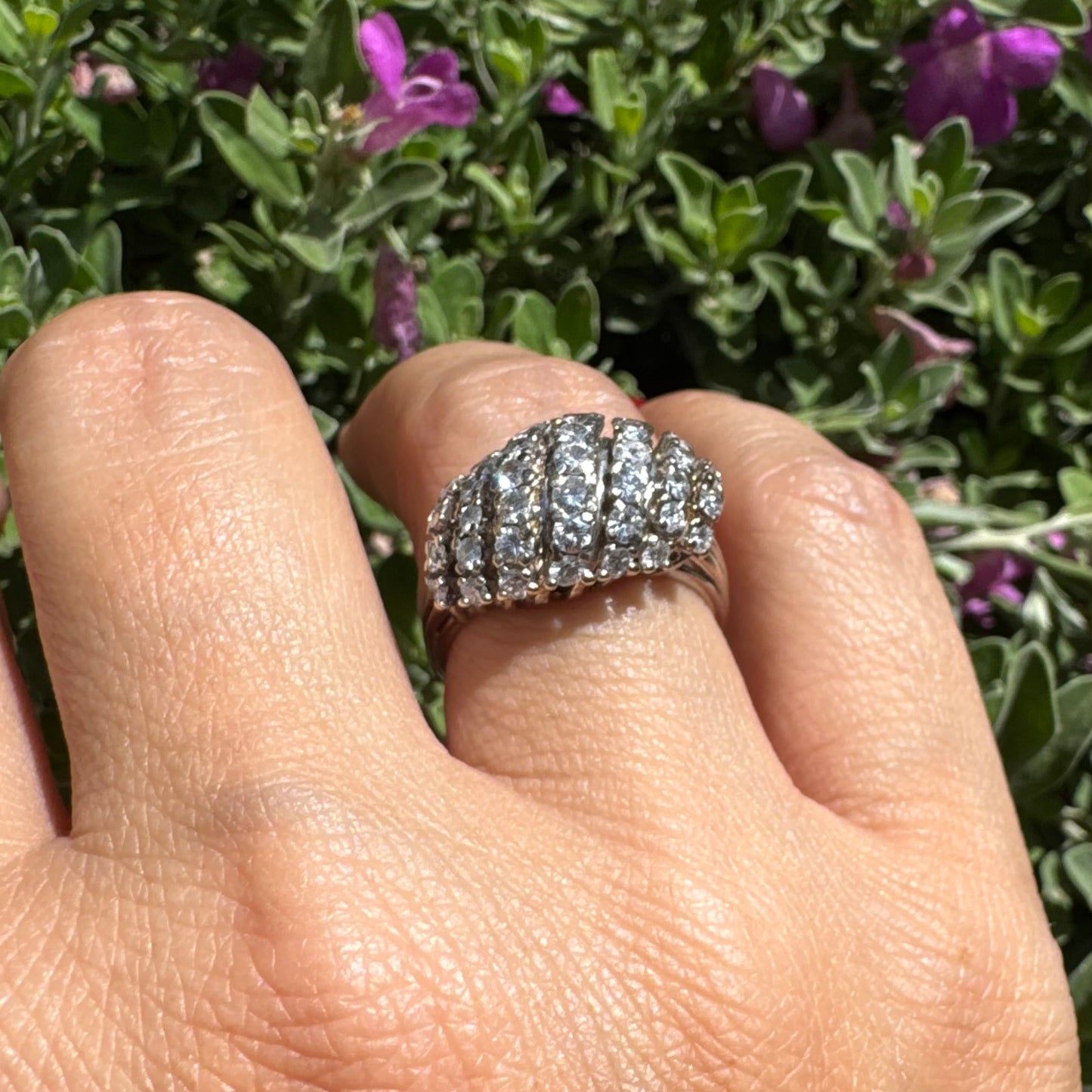 18K gold ring set with rows of sparkling Diamonds in a bold, sculptural design