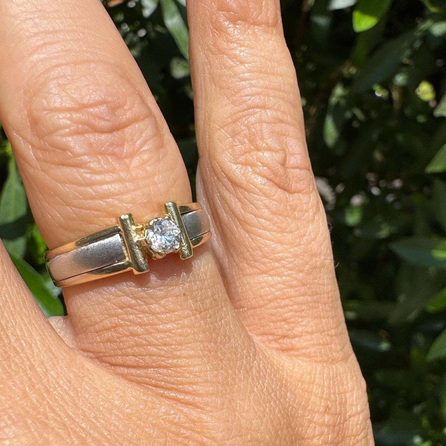 14K two-tone gold ring set with one center Diamond