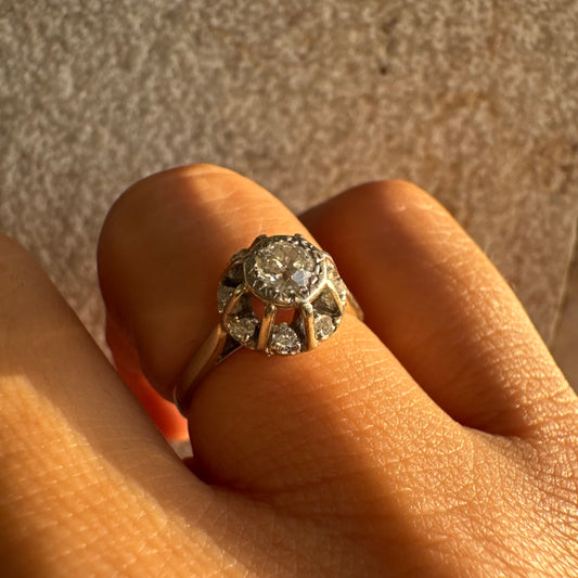 18K gold ring set with Diamonds in     a classic cluster-style