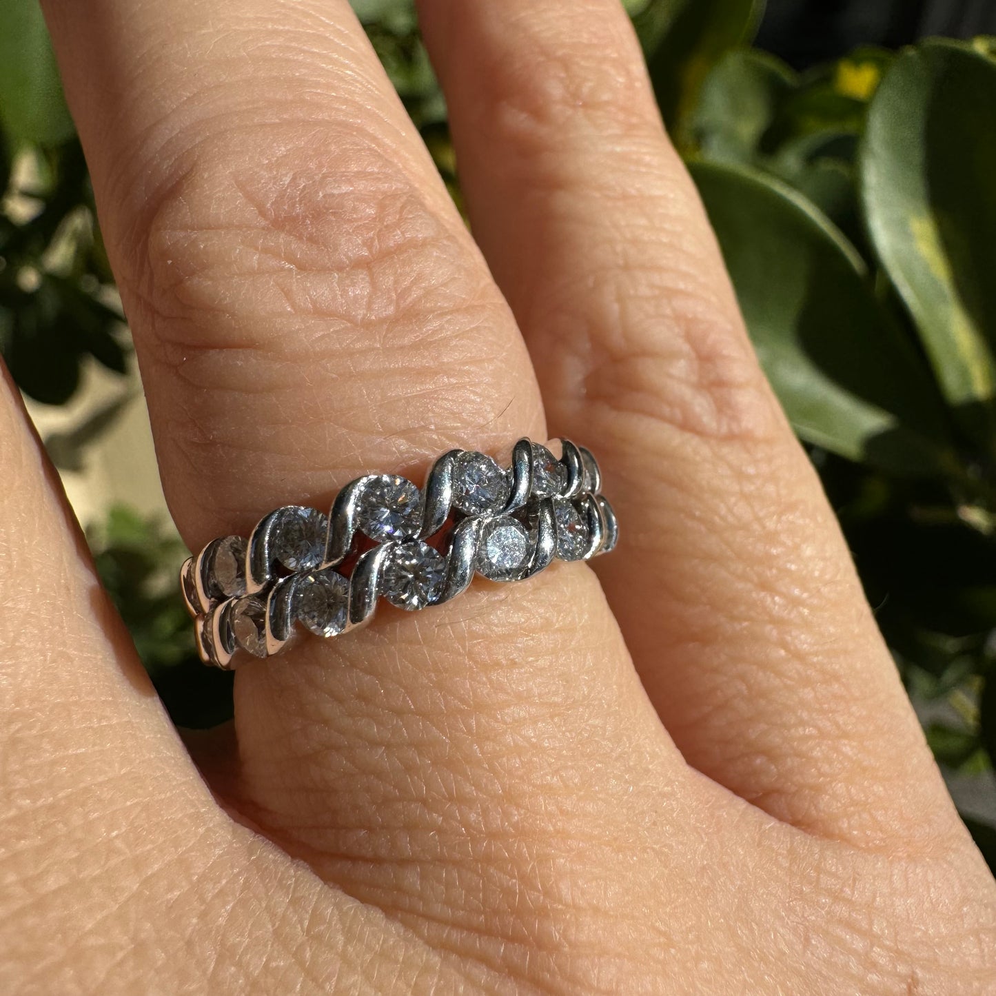 14K gold ring set with two rows of brilliant-cut Diamonds.