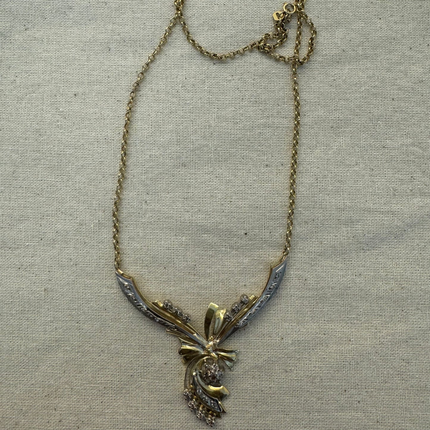 18K two-tone vintage necklace with a unique and elegant design set with Diamonds