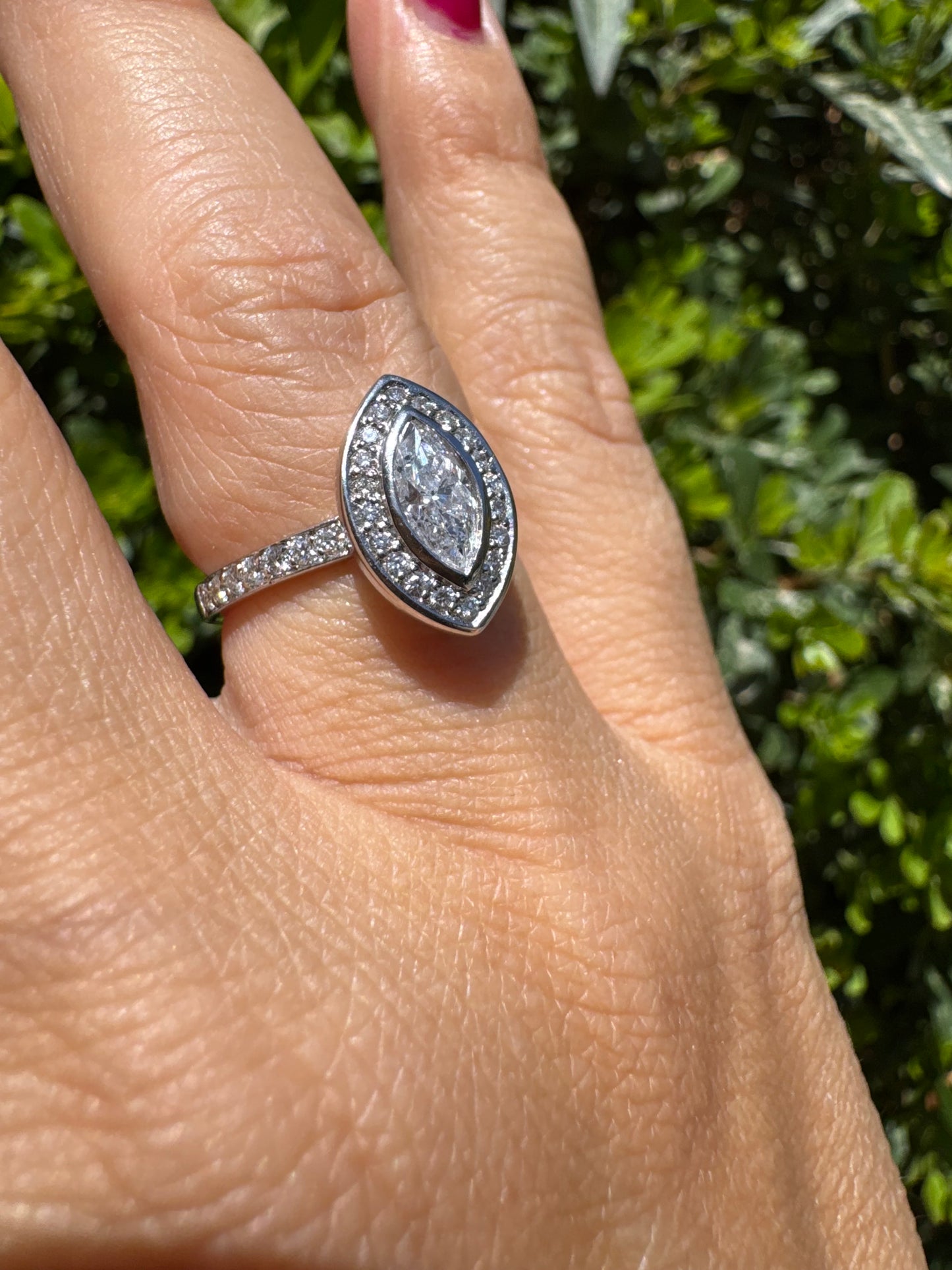 18K gold convertible ring set with two marquise-cut diamond halos that magnetically connect into a bold statement piece