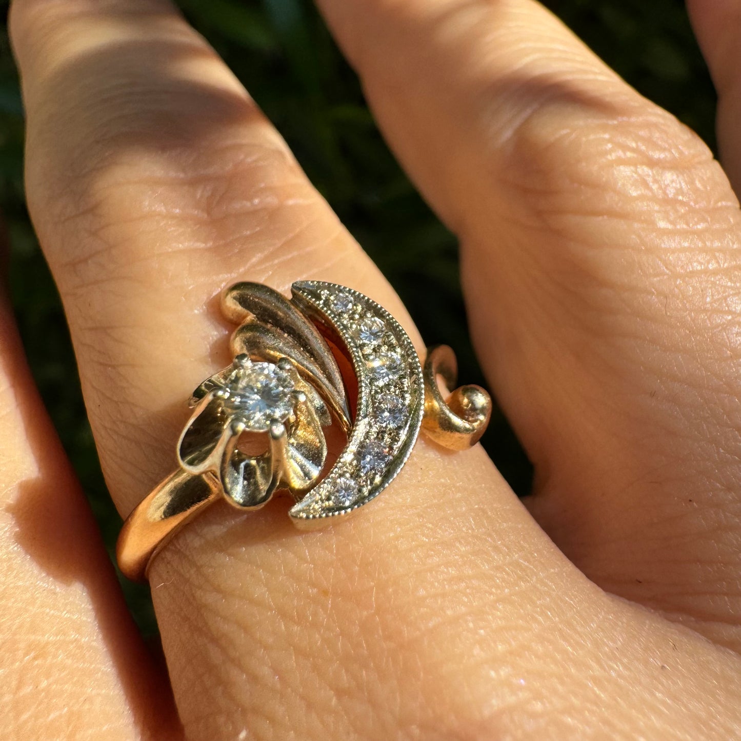 14K gold ring with a delicate moon and star motif set with Diamonds