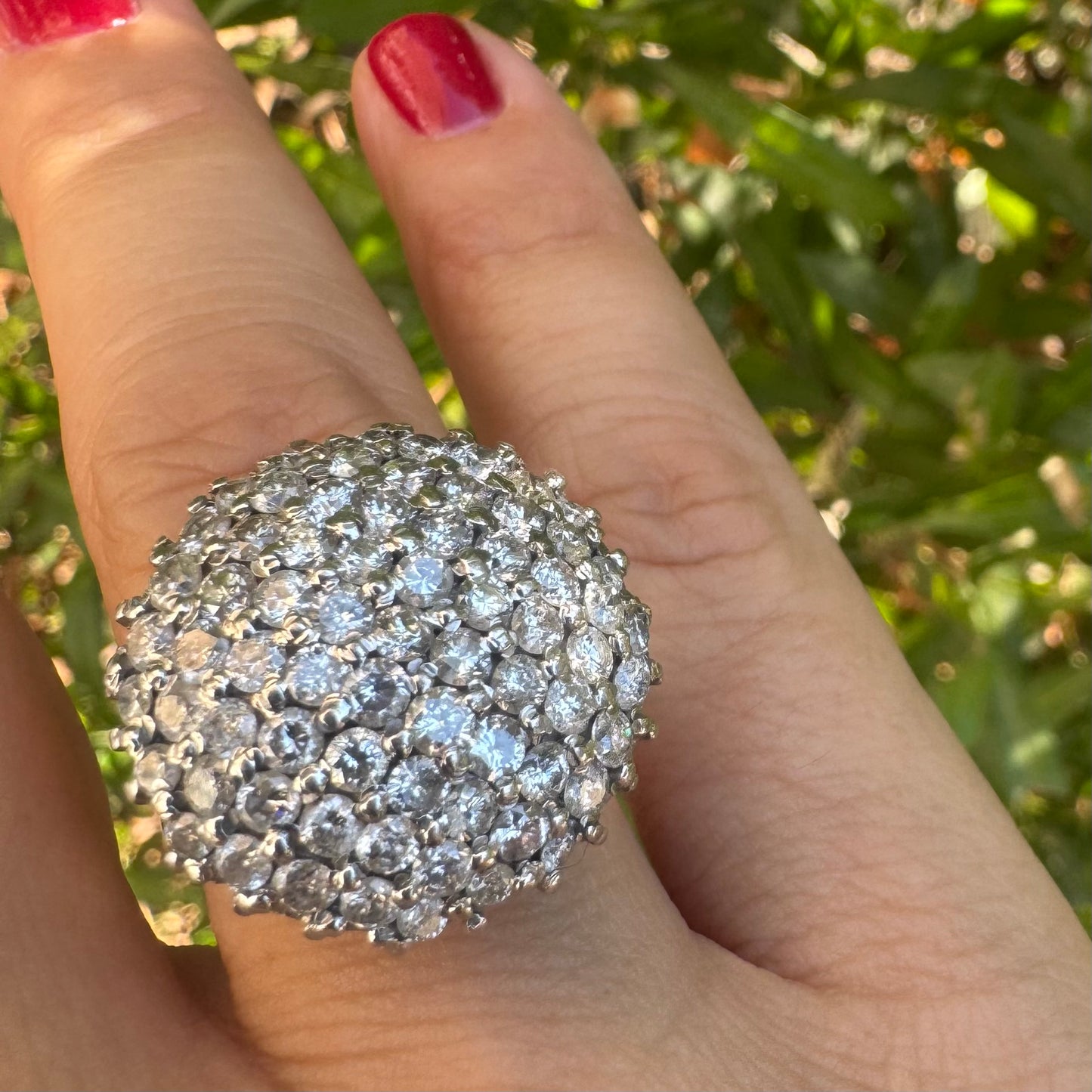 18K gold ring set with Diamonds in a bold pavé setting.