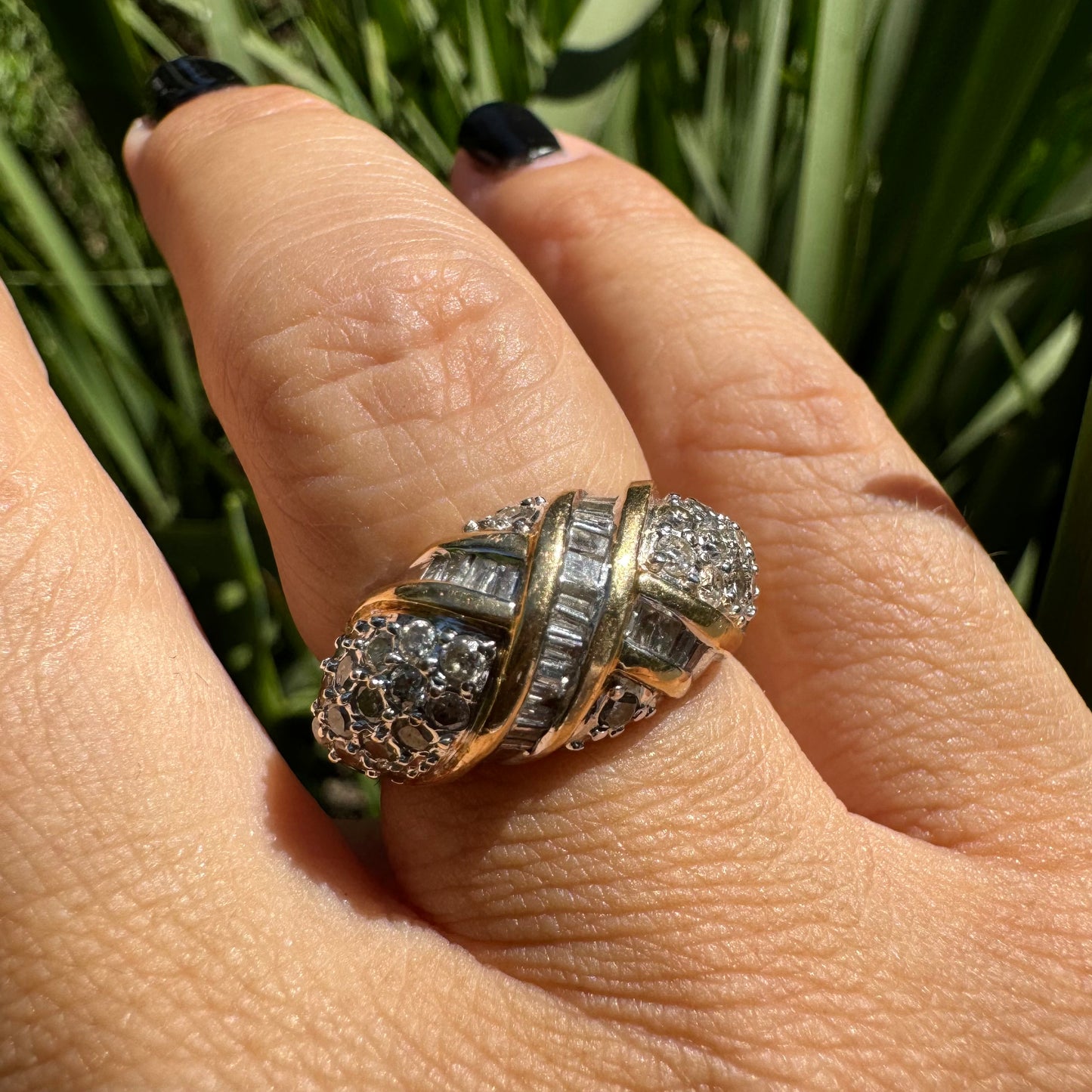 14K gold ring set with crisscrossed rows of baguette and round-cut Diamonds