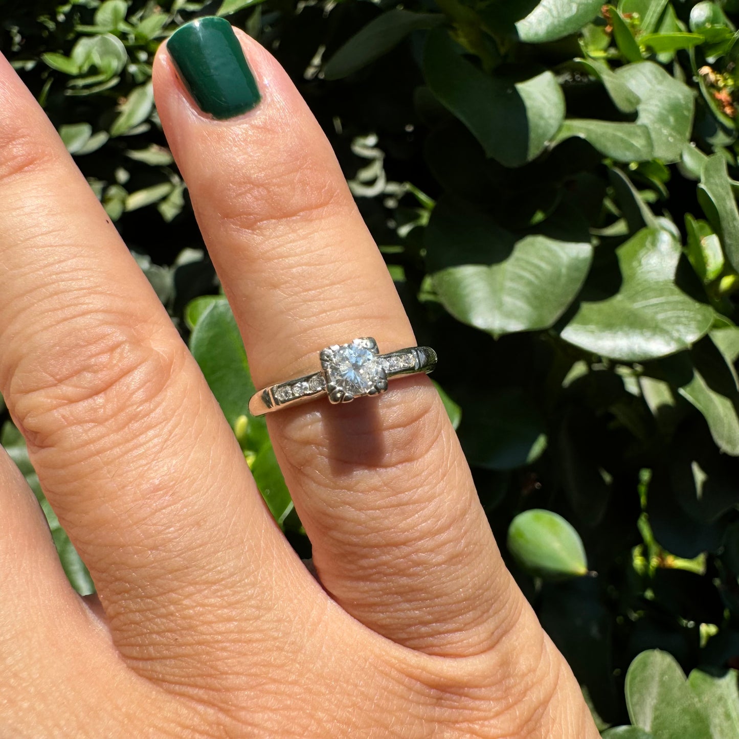 14K gold ring set with Diamonds