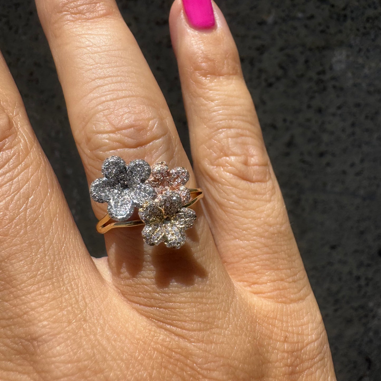 14K gold trio ring featuring white, yellow & rose gold blossoms, each encrusted with sparkling Diamonds.