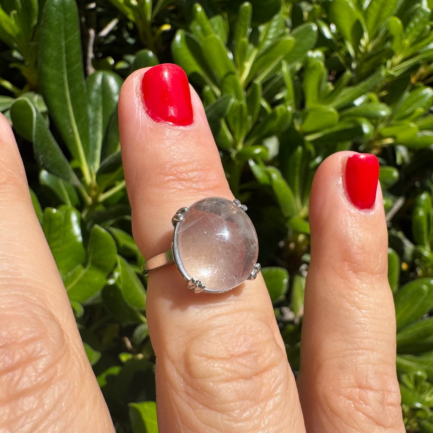 Palladium ring set with a large clear Rock Crystal cabochon.