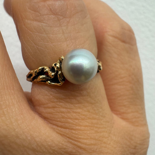 14K gold ring set a luminous white Pearl set on an ornate yellow gold band