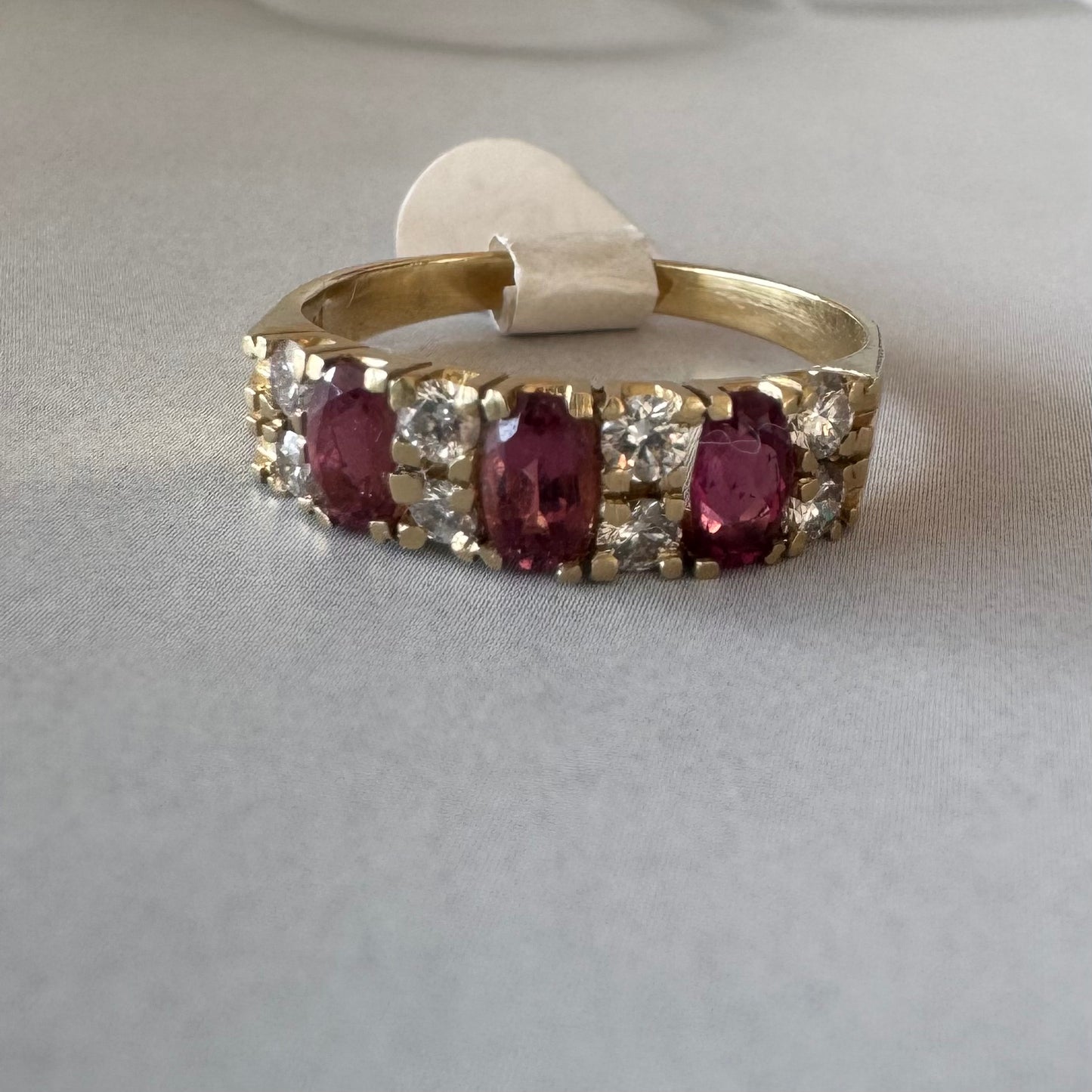 14K gold ring set with oval Pink Tourmalines and round brilliant-cut Diamonds