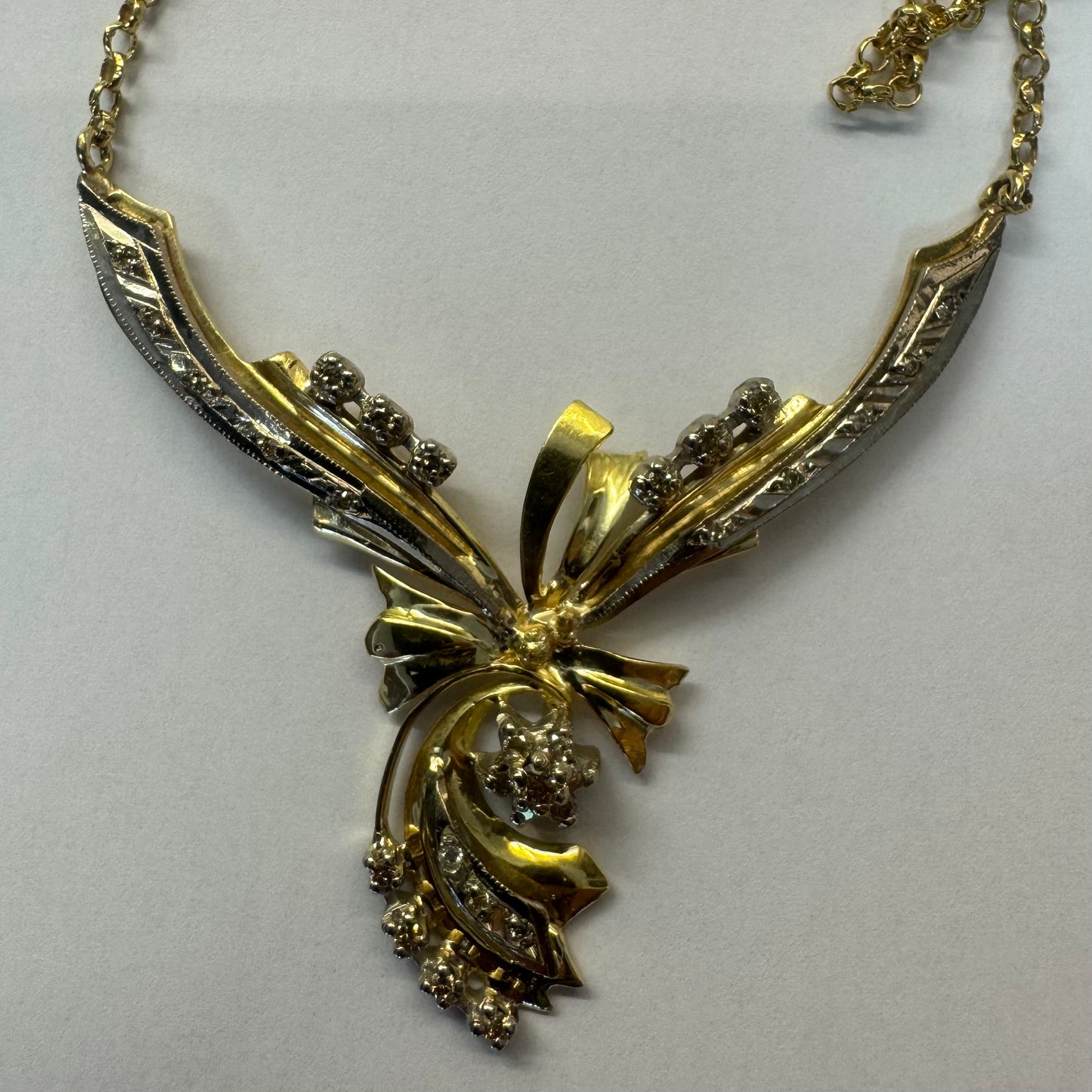 18K two-tone vintage necklace with a unique and elegant design set with Diamonds