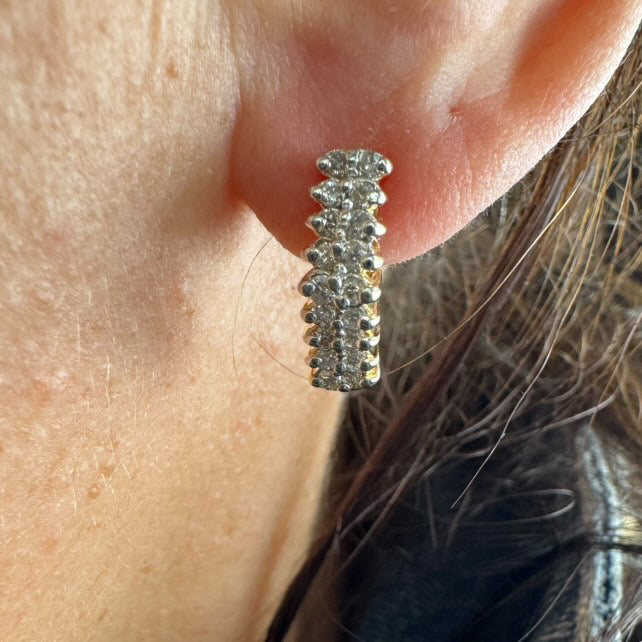 14K gold half-hoop earrings set with sparkling Diamonds in a dense pavé setting