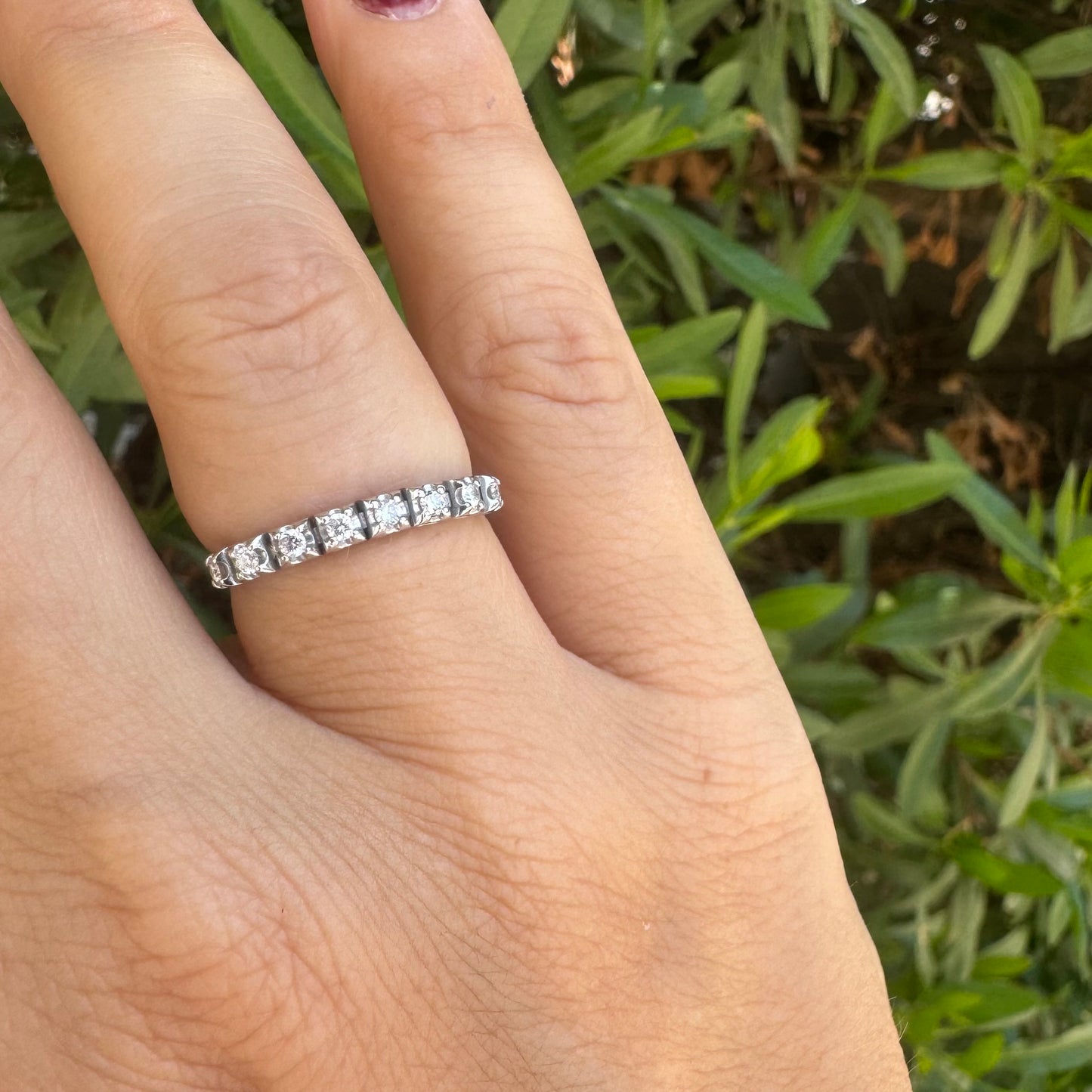 14K gold ring set with a row of sparkling Diamonds