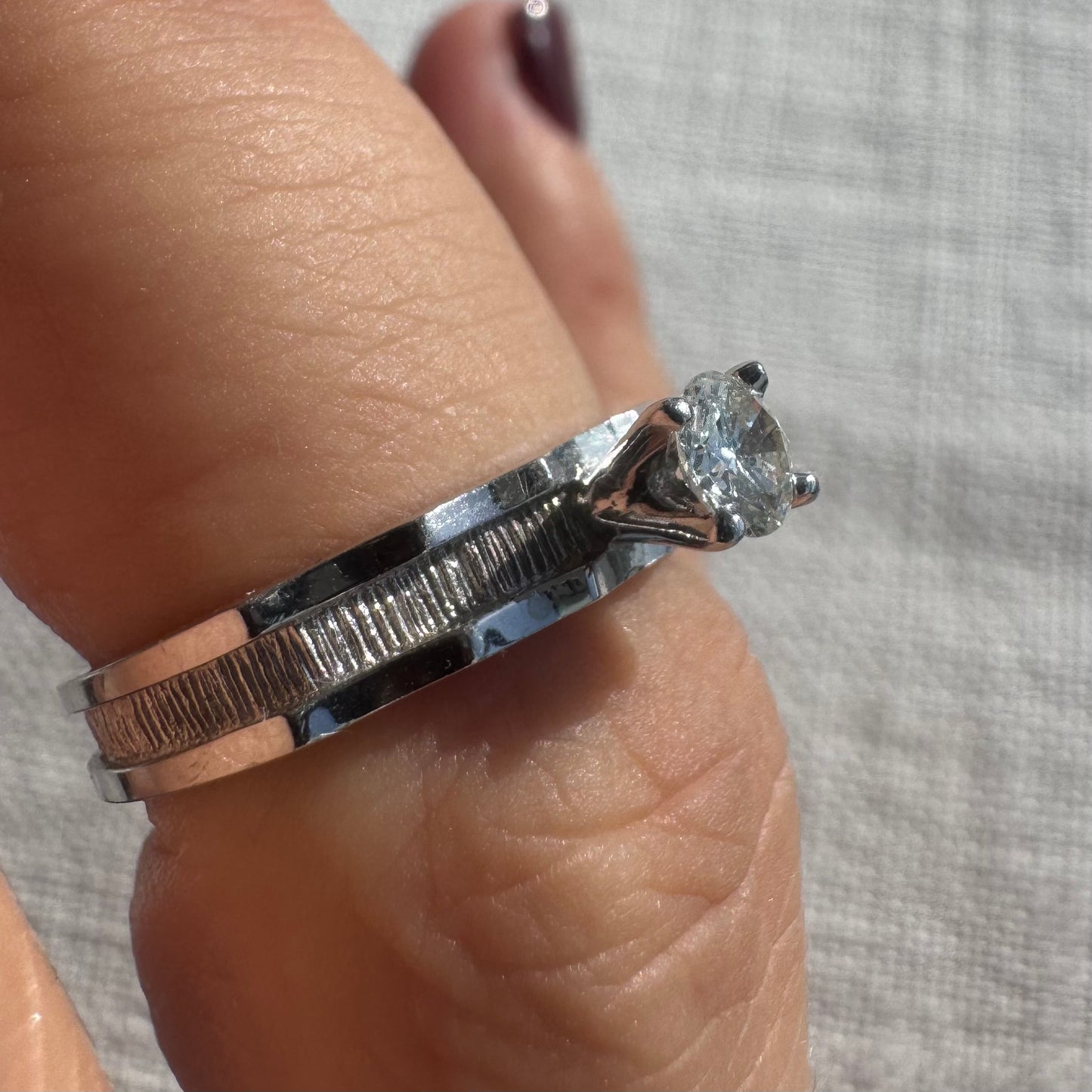 14K gold ring set with one center Diamond