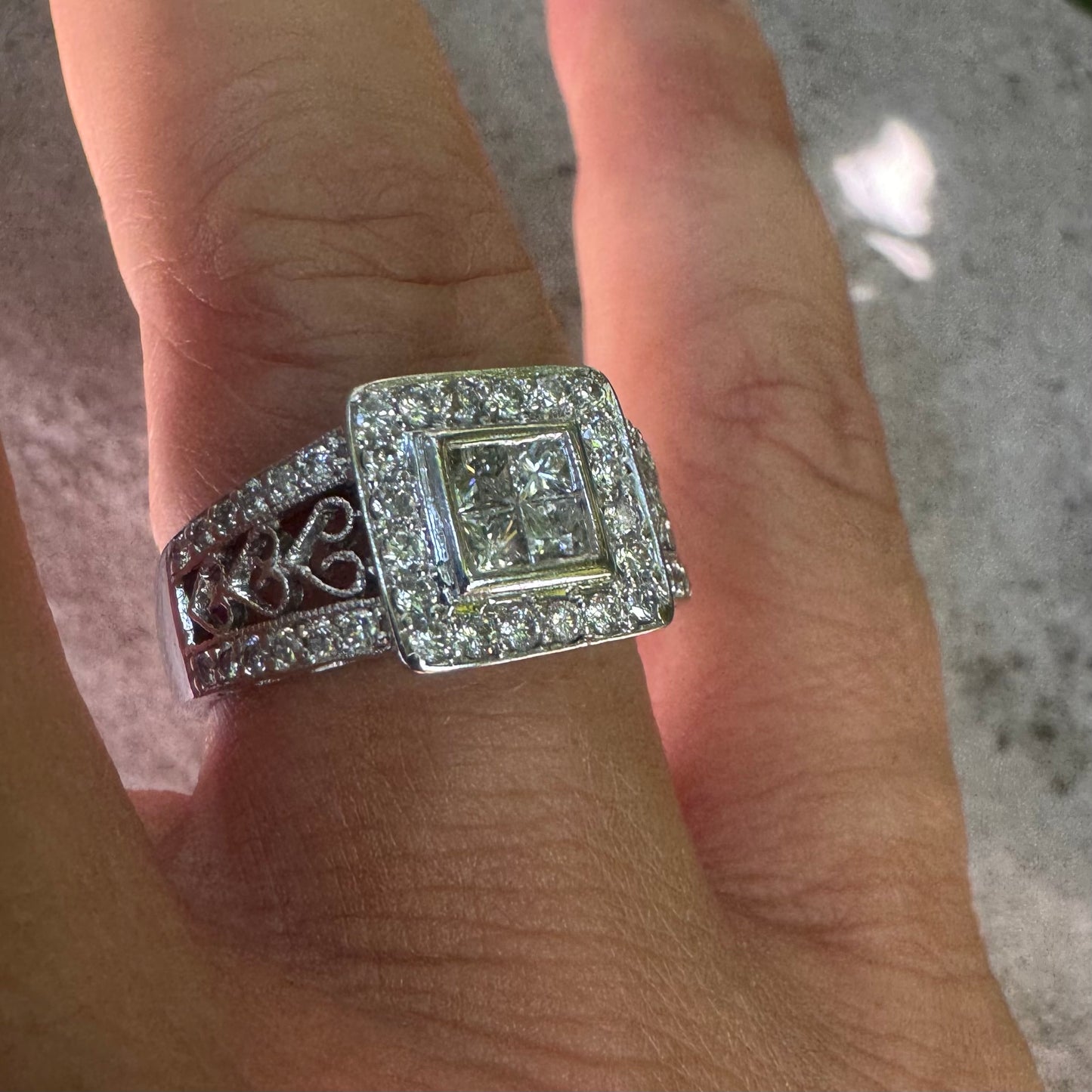 14K gold ring featuring a square cluster of princess-cut Diamonds in the center, surrounded by a double halo of smaller round Diamonds & gold details along the band.