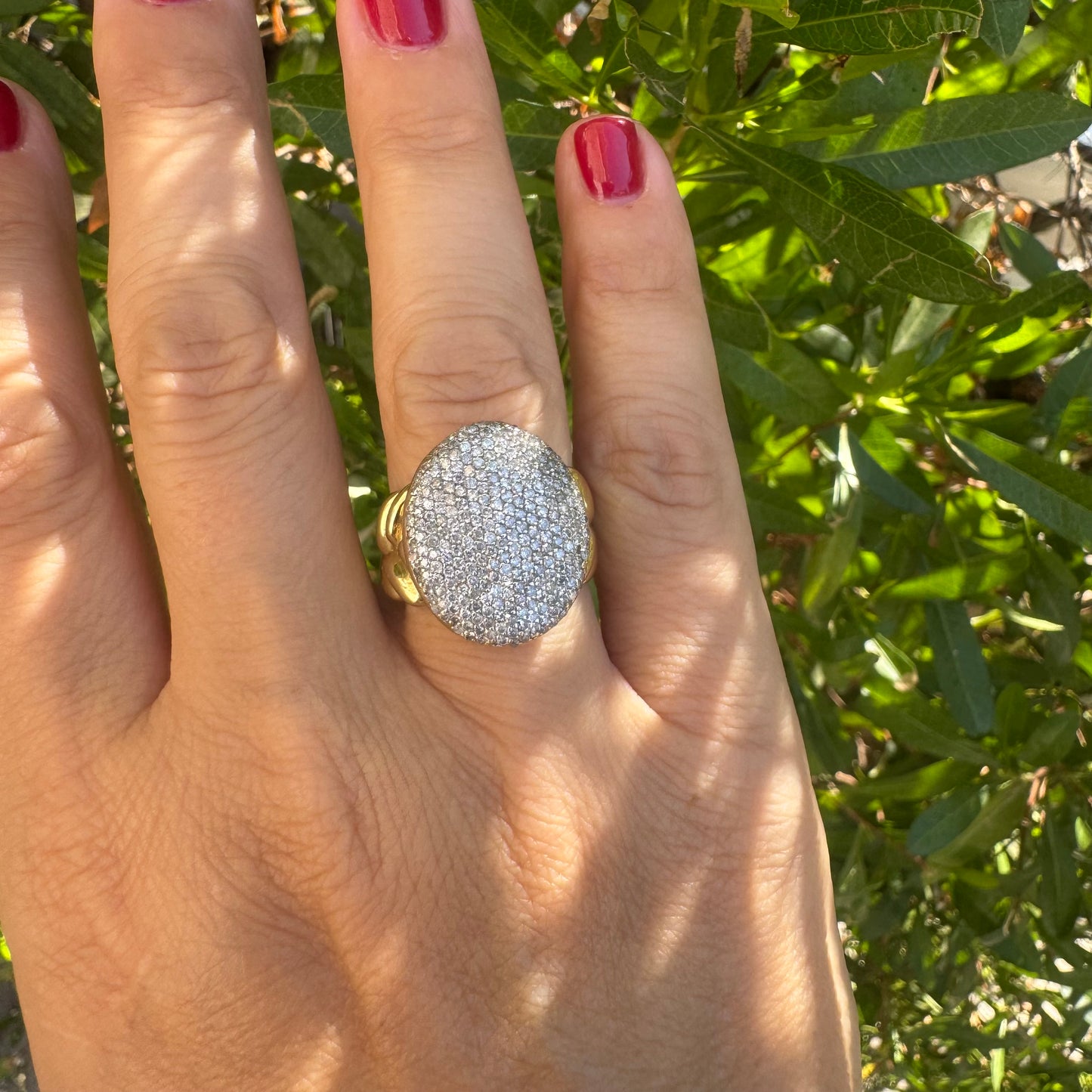 18K gold ring set with a dazzling dome of pavé-set diamonds