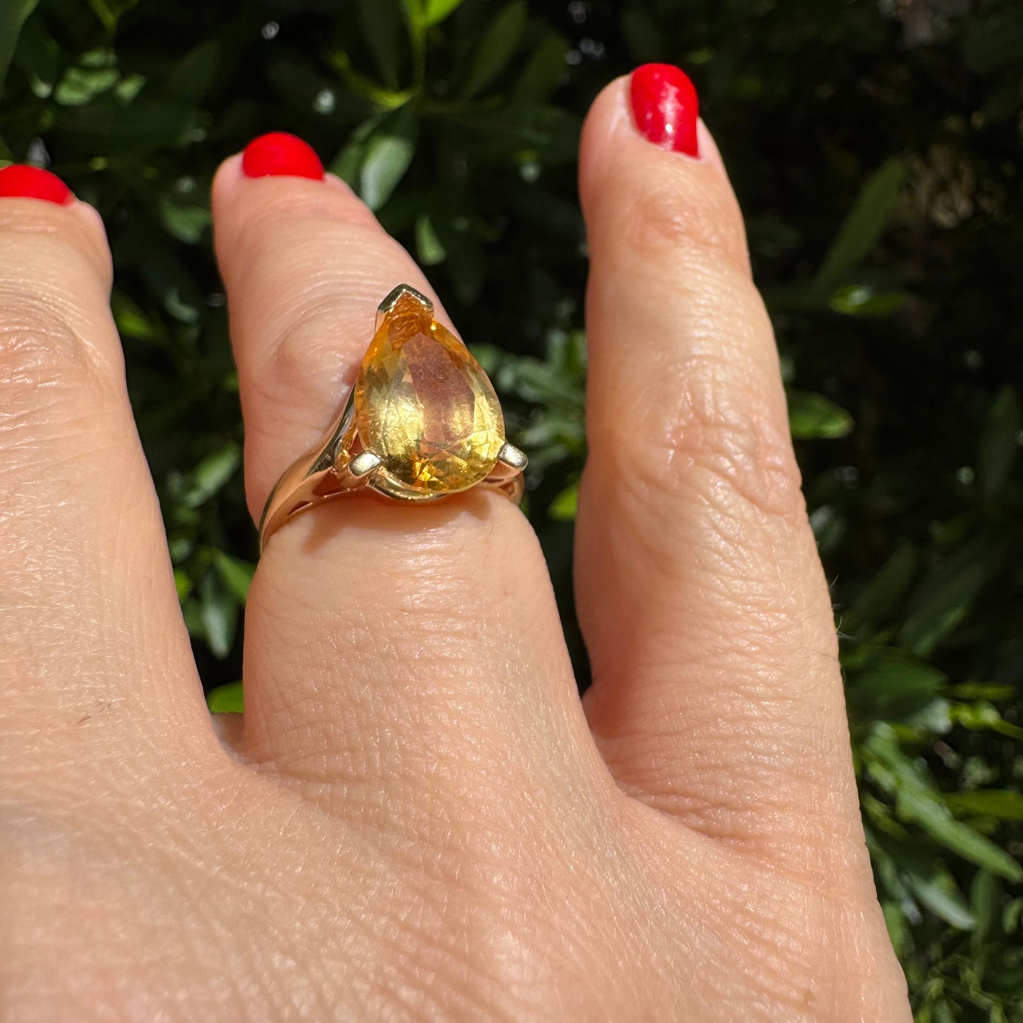 14K gold ring set with a large pear-shaped Citrine