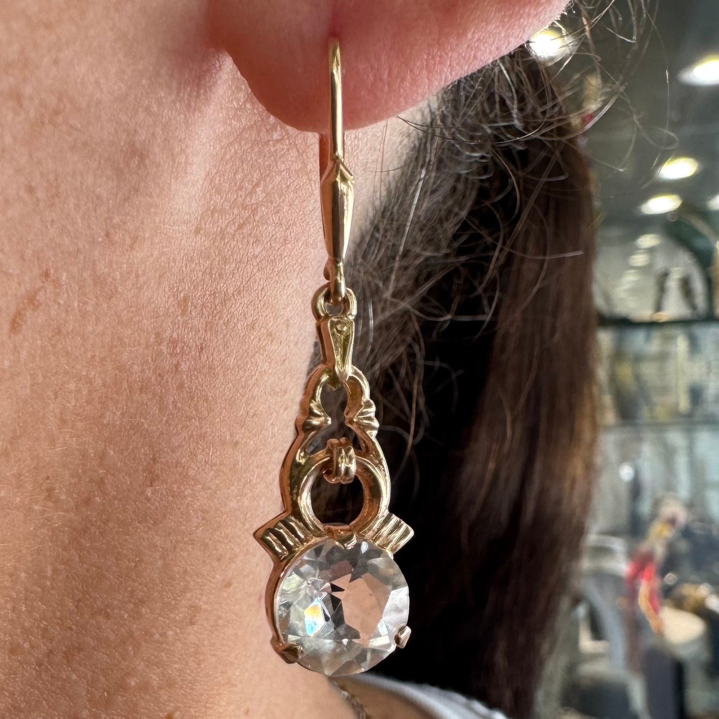 14K gold drop earrings crafted in warm gold, featuring old-cut clear stones