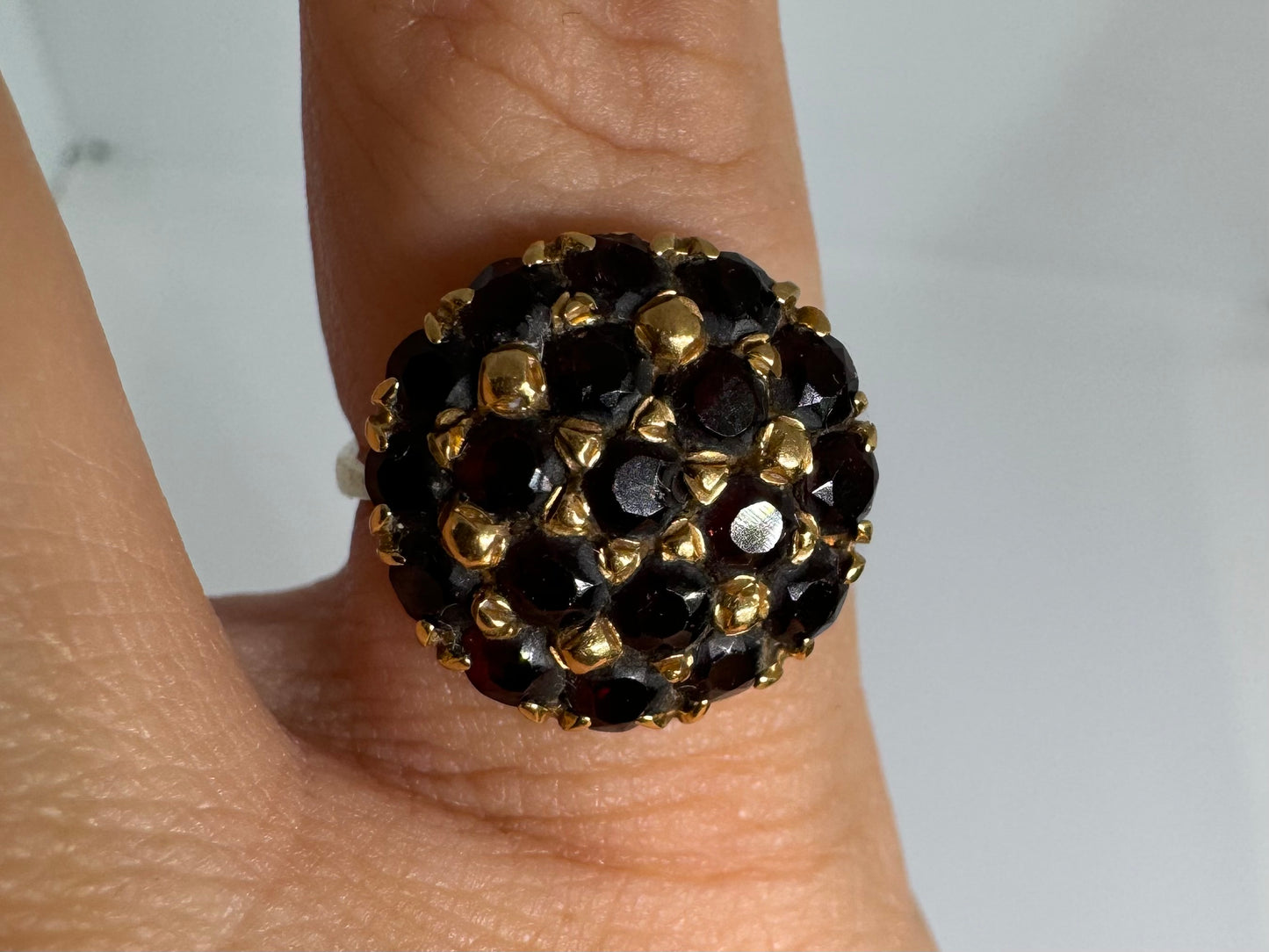 18K gold ring set with Garnets in rich gold prong settings