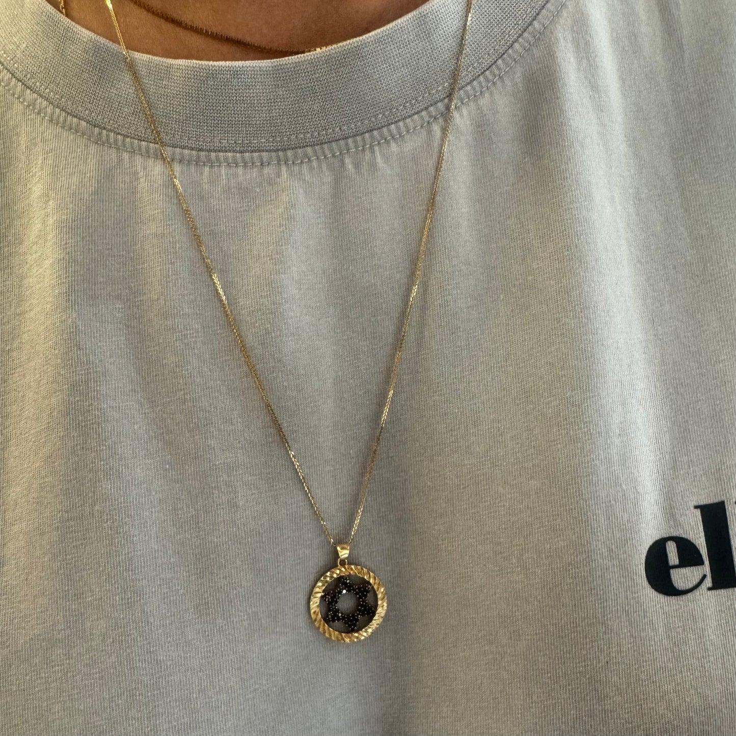 14K gold “Star of David” necklace set with Black Diamonds