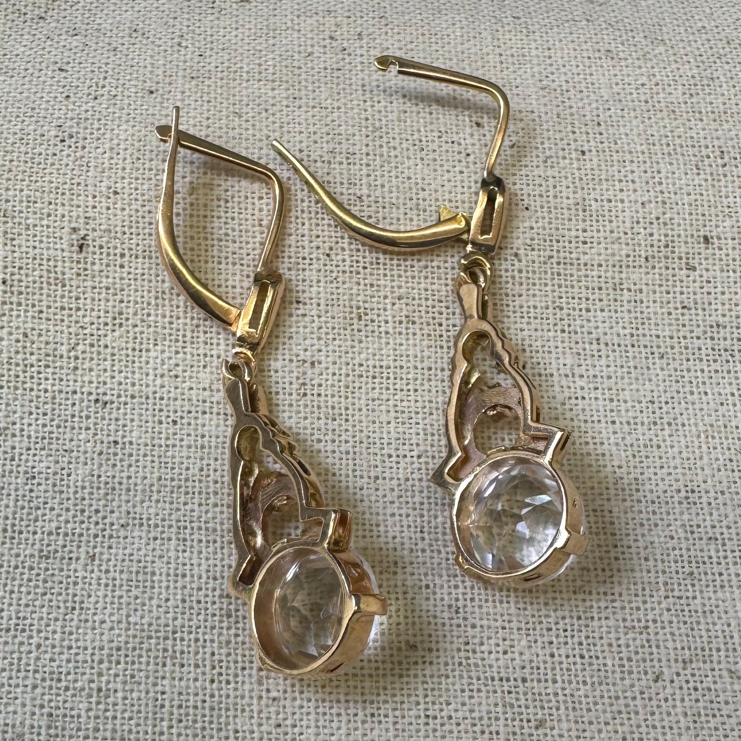 14K gold drop earrings crafted in warm gold, featuring old-cut clear stones