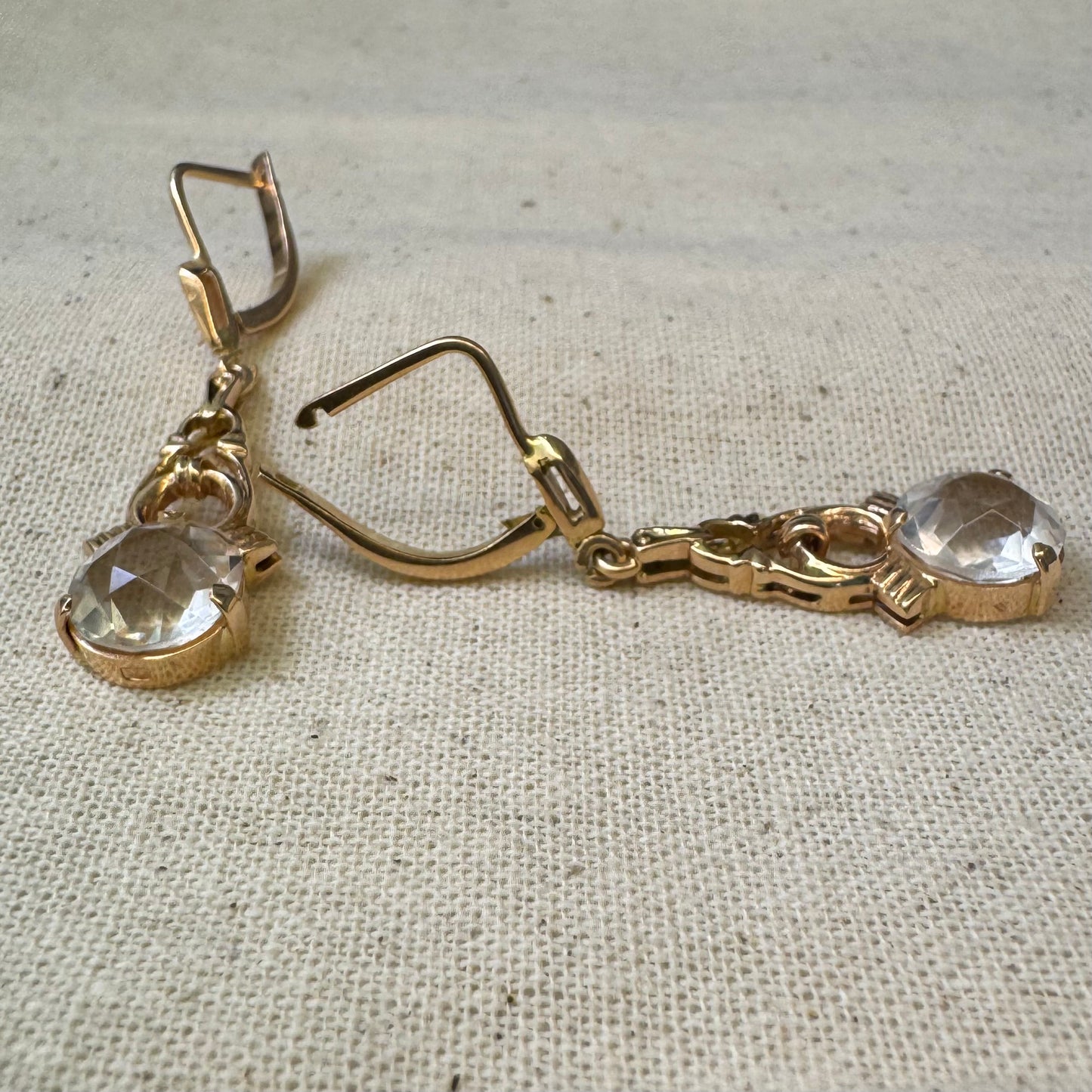 14K gold drop earrings crafted in warm gold, featuring old-cut clear stones