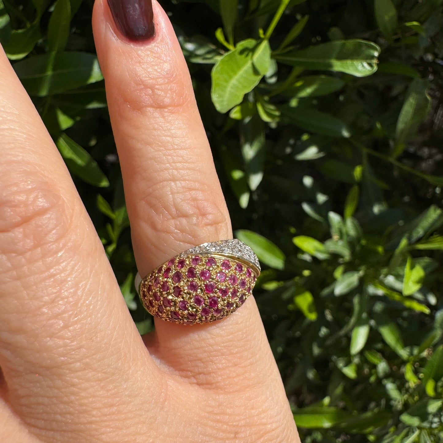14K gold dome ring pavé-set with Diamonds and vivid Rubies in a striking two-tone design