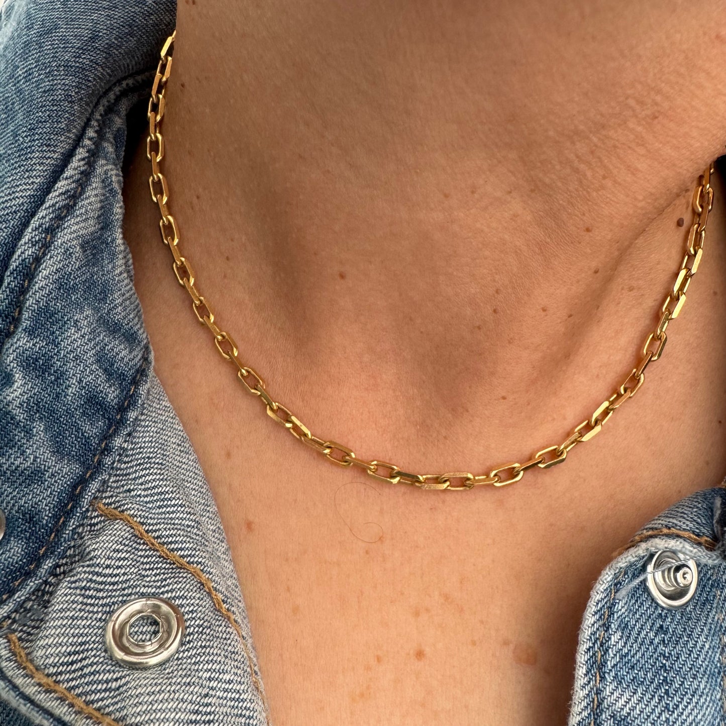14K gold chain necklace featuring elegant elongated links with a polished finish.