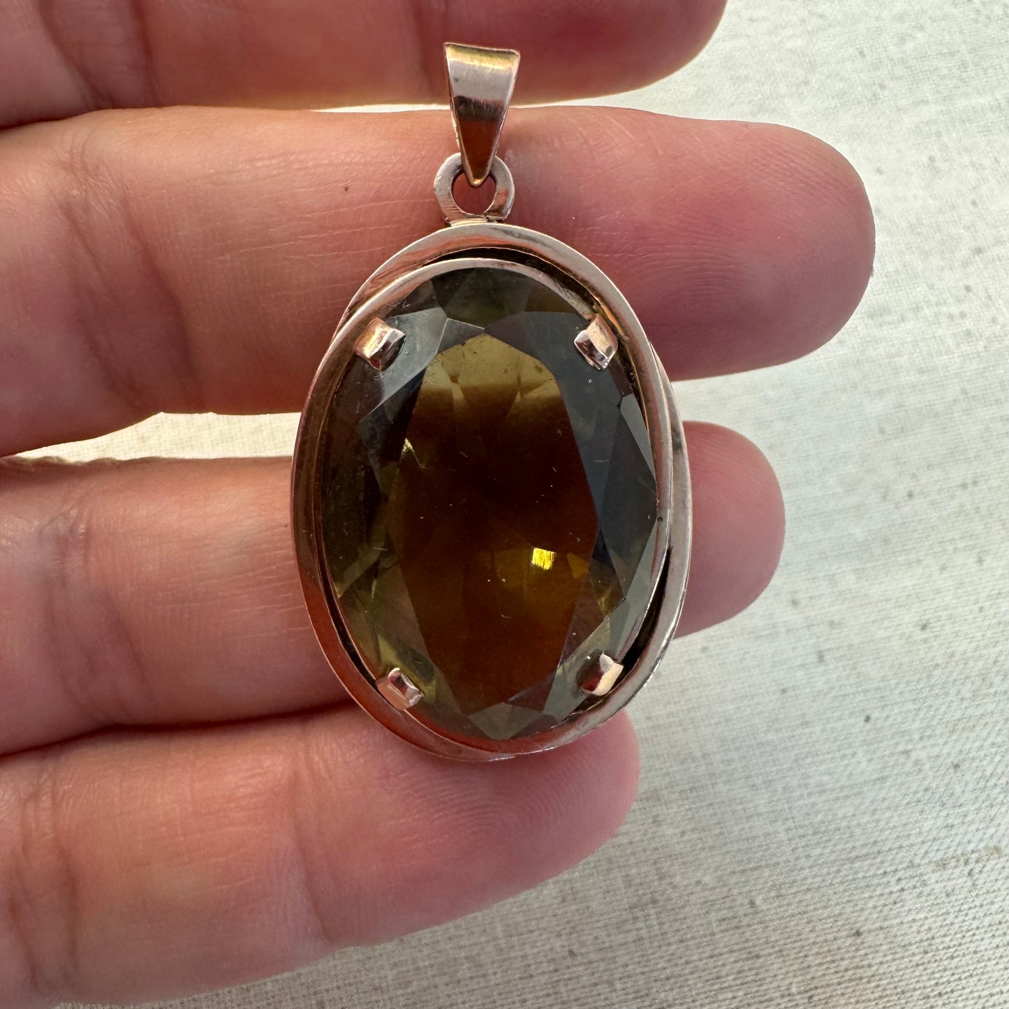 14K gold pendant set with a large oval-cut Smoky Quartz in a rare olive-green hue