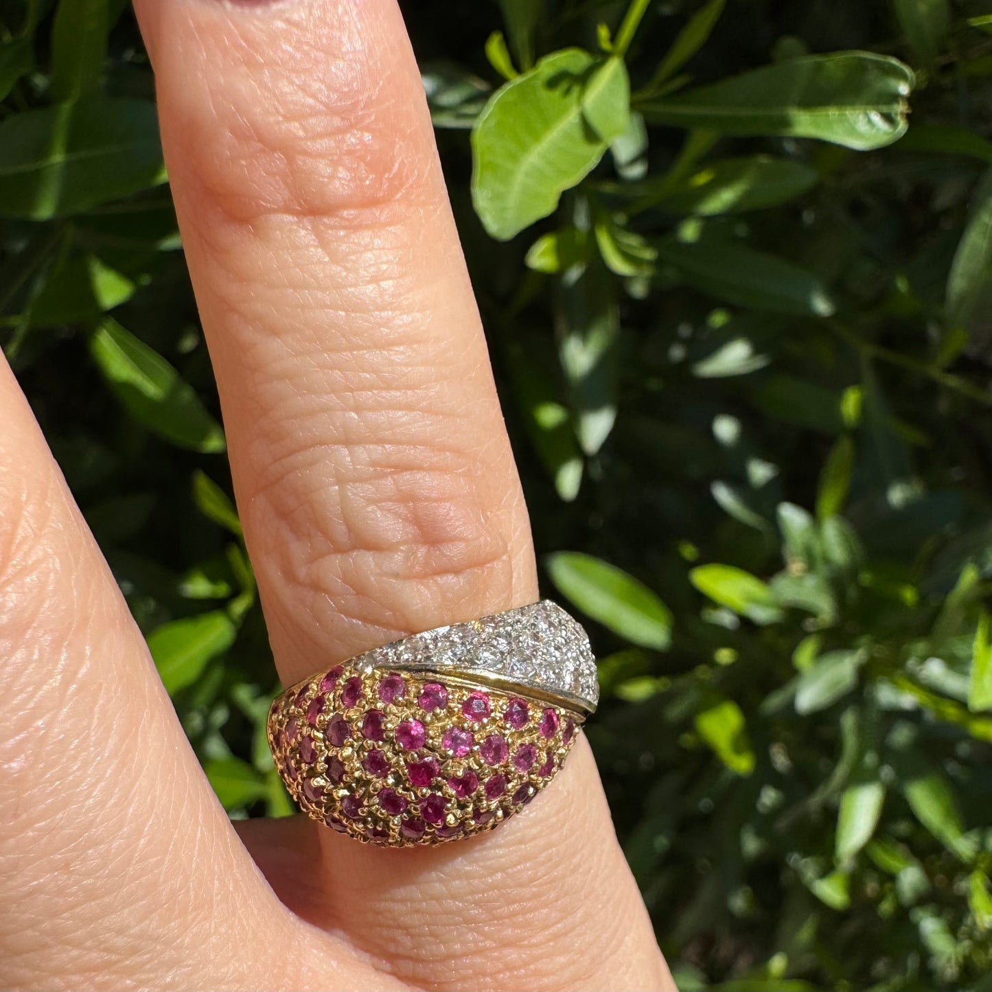 14K gold dome ring pavé-set with Diamonds and vivid Rubies in a striking two-tone design