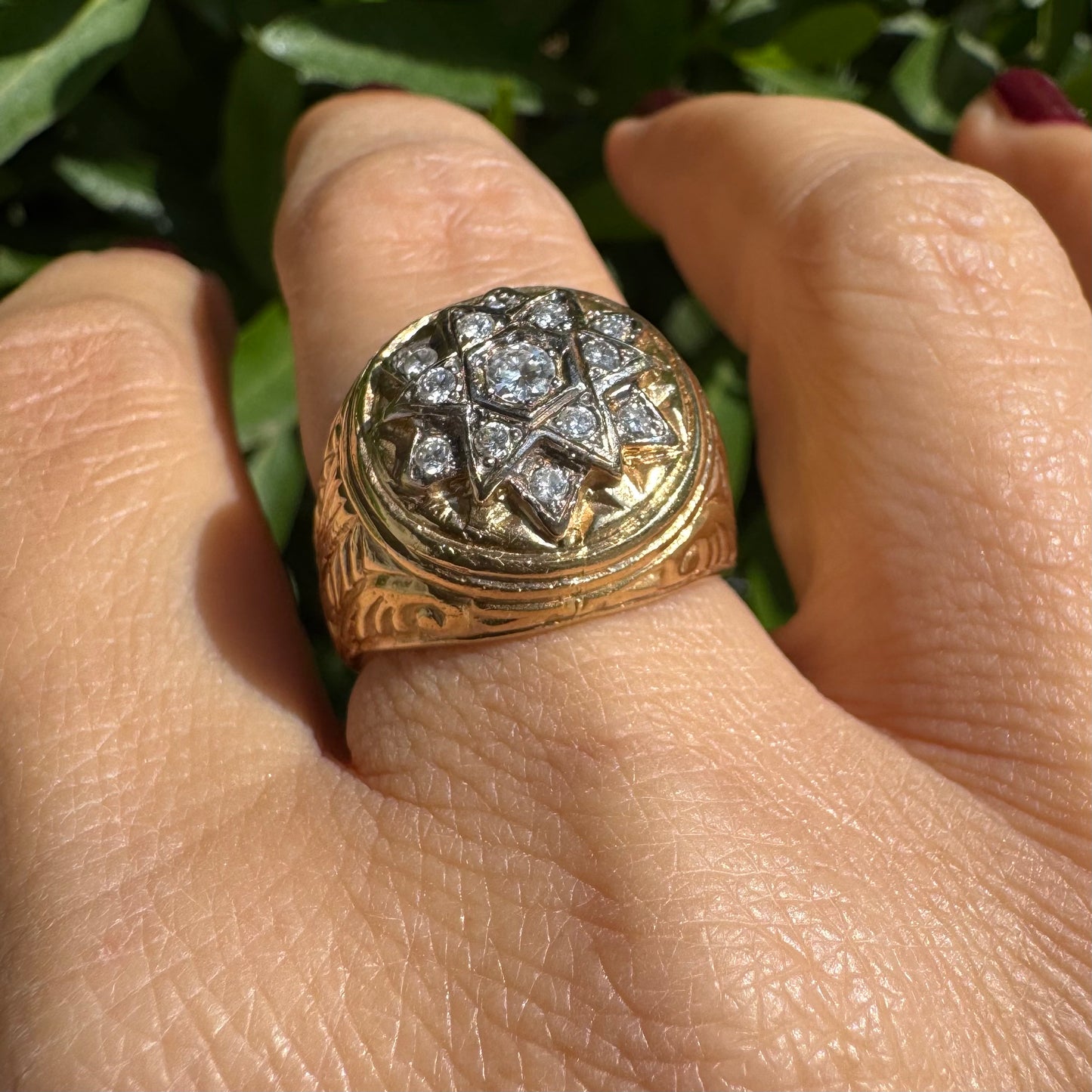 18K gold ring set with a dazzling double Star of David motif, meticulously set with shimmering Diamonds